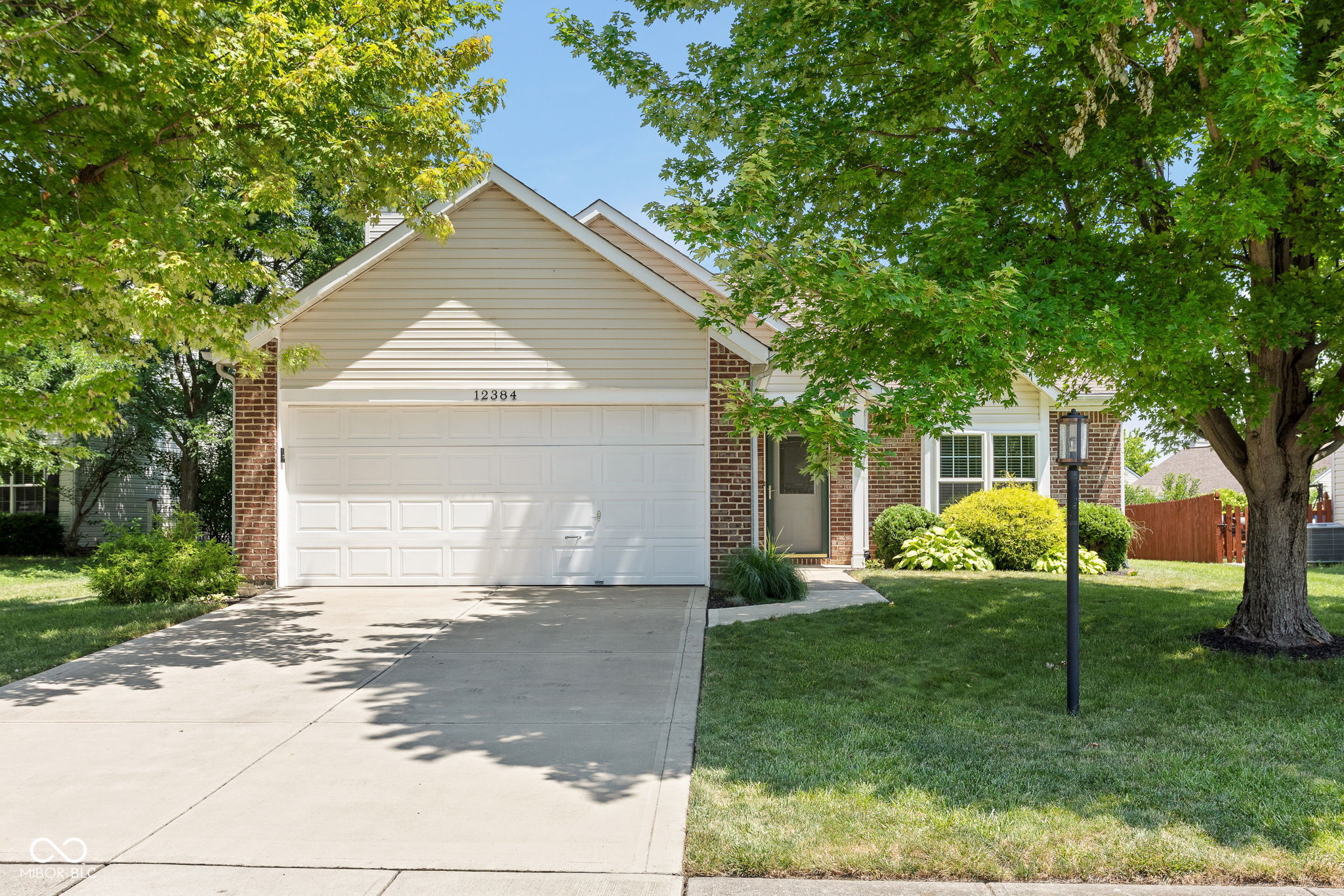 A dream come true! A pristine one-level home that's been completely revamped located on a quiet cul-de-sac with a peaceful and private backyard!!!  You won't be disappointed from the moment you step inside - you'll be greeted with soaring ceilings and continuous hard surface flooring! The warm and welcoming family room is anchored by a wood burning fireplace flanked by two windows that allow the natural light to pour inside! An open concept floor plan leads into the kitchen with crisp, white cabinets that are offset with dark cabinet hardware and a high-end stainless steel appliance package! There is a spacious eat-in area of the kitchen currently used as a casual office (since it has the BEST views) - a great spot to sit and soak up the daily news with a cup of coffee! Notice the custom built-in display in the kitchen too! The primary suite overlooks the backyard, trees and pond! Ah serenity! The primary bath has double vanities and a frameless glass shower... and its adjacent to the WIC! 2 spare bedrooms both with 2 closets and a nearby guest bath - complete with a granite-topped vanity! Outside you'll find an incredible oasis with a paver patio that leads to a hot tub, a fully fenced rear yard, a pergola, firepit... AND...you will get to enjoy the sounds of crickets and frogs chirping beside the pond! This package is completed by a functional garage with tons of organizers and room for 2 cars are MORE! Updates: Deck @ hot tub (2024), extra storage in garage, roof (2014), appliances (2018), dishwasher (2024), driveway (2022), programmable thermostat, AC (2022), converted to gas furnace (2022)!!! Gray Eagle Pool is just minutes away and open to the public... and Brooks School Park is literally a stone's throw away! Come see this gem for yourself - you don't want to miss!