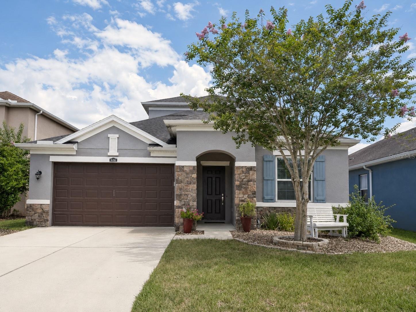 Virtually Staged. LOVE TAMPA PALMS BUT WANT A NEWER HOME? THIS IS THE ONE. Welcome to 16361 Hyde Manor Drive, ideally located in Stafford Place, one of the newest sections of highly sought-after Tampa Palms. Built in 2017, this beautifully maintained home offers 4 bedrooms, 4 full baths, approximately 2,770 square feet of living space, a spacious bonus room and a 2-car garage.For buyers who love the established beauty, mature landscaping and unbeatable location of Tampa Palms but want the modern design, energy efficiency and lower-maintenance advantages of newer construction, this home offers a rare opportunity. Even better, Stafford Place is a maintenance-free community, giving you more time to enjoy the Florida lifestyle and less time worrying about exterior upkeep.Step inside to a versatile, open floor plan designed for both everyday living and entertaining. The spacious Great Room flows seamlessly into the kitchen and dining areas, creating a comfortable central gathering space. A generously sized 18x13 primary suite, three additional bedrooms and four full baths provide plenty of room and privacy, while the impressive 14x20 bonus room offers tremendous flexibility for a media room, game room, home office or additional living area.And then there’s the homesite. Step outside to a covered patio overlooking a tranquil pond with conservation beyond, creating a peaceful natural backdrop and a level of privacy that is increasingly difficult to find.This home offers a combination that is exceptionally hard to duplicate in Tampa Palms: newer construction, maintenance-free living, 4 bedrooms and 4 full baths, a large bonus room, and beautiful pond and conservation views. All of this while enjoying the convenience, amenities and established surroundings that have made Tampa Palms one of New Tampa’s most desirable communities.If you’ve been waiting for newer construction in Tampa Palms without giving up the location and lifestyle you love, this may be the one.