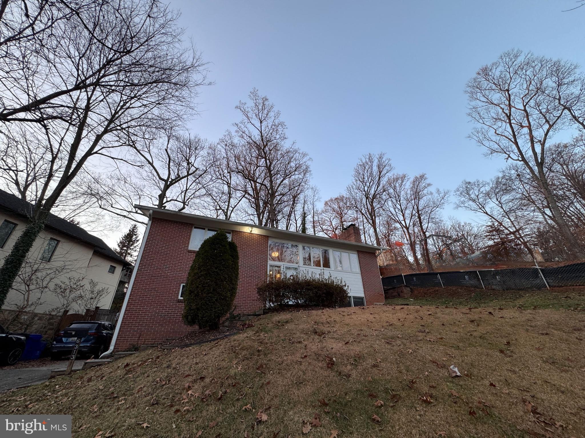 Updated Mid-Century Modern Split Level in Brookmont Beautifully updated and filled with natural light, this mid-century modern split-level home offers 4 bedrooms and 2 full baths in the highly desirable Brookmont neighborhood, just moments from Glen Echo, MacArthur Blvd, Massachusetts Ave, and the C&O Canal towpath The upper level features an airy open layout with a vaulted ceiling, three skylights, and a striking wall of casement windows that bring in sweeping natural light and create a bright, inviting main living area.. Newer windows, white walls, and hardwood floors create a bright, clean, modern aesthetic throughout. The renovated kitchen showcases white cabinetry, granite countertops, a full-height subway tile backsplash, stainless-steel appliances, recessed lighting, pendants, and an island with breakfast bar seating—perfect for everyday living and entertaining. The dining area opens to a spacious deck and a landscaped backyard, offering a private setting for outdoor dining and relaxation. Two bedrooms and an updated full bath complete the upper level. The lower level offers exceptional flexibility, featuring a spacious family room, two additional bedrooms, a second full bath, and a well-appointed laundry room with extra storage—creating a convenient layout for guests, a home office, or recreation. With a school bus stop directly in front of the home and Mohican Hills Pool (non-profit membership) within walking distance, the location is exceptionally convenient. No smoking. No cats; dogs considered case by case. LOCATION:  Located in coveted Brookmont—steps to neighborhood parks, minutes to the C&O Canal towpath, Glen Echo Park, and a quick drive to downtown Bethesda. Zoned for Wood Acres ES, Pyle MS, and Whitman HS, with easy access to I-495, I-270, and the Bethesda Metro.