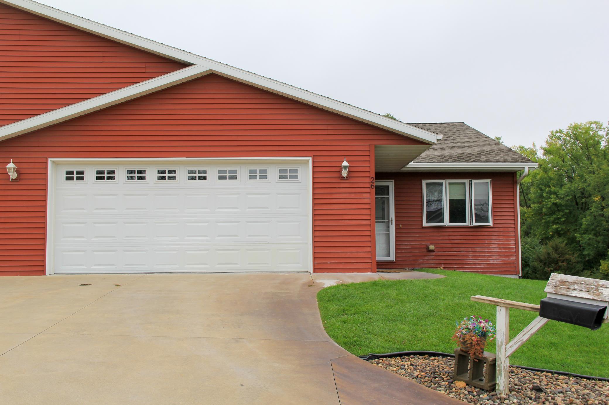 Beautiful Low-Maintenance Home on a Quiet Dead-End StreetEnjoy comfortable main-level living in this spacious 4-bedroom, 3-bathroom home located on a quiet dead-end street. This home offers a great combination of comfort, convenience, and easy living.The main level features an inviting living area along with a dedicated office, making it easy to work from home. The spacious primary suite includes a private master bathroom and walk-in closet.Stay comfortable year-round with in-floor heat, forced-air heat, and central air conditioning. The attached 2-stall heated garage provides plenty of room for vehicles, storage, and hobbies.Enjoy a truly low-maintenance lifestyle thanks to the association that takes care of the lawn, sprinklers, and snow removal. A huge lower level storage area is great for all your personal belongings. Plus, you’ll have access to a bonus 8’ x 32’ shared storage area in the back—perfect for extra belongings, seasonal items, or equipment.With 4 bedrooms, 3 bathrooms, an office, heated garage, multiple heating options, and exterior maintenance handled by the association, this home offers the space and convenience you’ve been looking for!