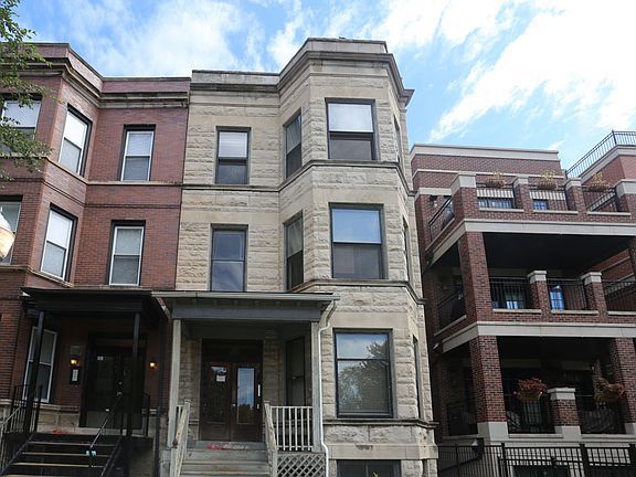 Prime Lakeview 2bd/1ba walk up in beautiful greystone building! Beautiful vintage features including original woodwork, bay windows, tall ceilings and hardwood flooring throughout. Newer kitchen and bathroom feature ceramic tile. Spacious living / dining room and decorative fireplace with mantel. Large bedrooms include ample closet and storage space. Enclosed back porch and on-site laundry. Heat, water, sewer and trash included in monthly rent. Amazing Lakeview location on tree lined street. Walk to everything including the Belmont stop (~one block), the lake, Wrigley Field, restaurants, and more! Easy street parking. No pets. Available 9/15.