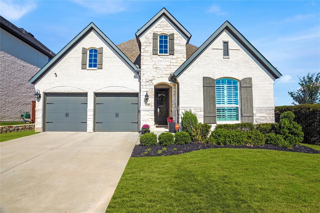 Welcome to your next chapter in Windsong Ranch — one of North Texas’ most coveted communities, where resort-style living meets small-town charm. With walking trails, the breathtaking Lagoon, and the brand-new Bridges Amenity Center just two streets away, this home is perfectly positioned to enjoy it all. Set on an oversized corner lot with peaceful views, this 4-bedroom, 3-bath WITH a study American Legend home was lovingly customized with all the right upgrades by its original owner- blending comfort, design, and craftsmanship in every detail. From the private study with serene views of the creek and trees (no side neighbors!) to the extended patio overlooking the pool-sized yard, every inch was thoughtfully designed for comfort and style. Upgrades include an epoxy-coated garage floor, new garage hardware, a city-permitted garbage pad, wood plantation shutters, accent walls in the dining, study, and entry ceilings, remote-control ceiling fans in four rooms, and a freshly re-stained fence. The landscaping is lush and meticulously maintained, offering curb appeal that perfectly complements the French-country-inspired exterior. Three hard-wired security cameras on the exterior keep you feeling safe and an eye out for those ding-dong ditchers! The location is unbeatable — two streets from The Bridges, three from the future pickle-ball courts, and a quick golf cart ride to the Lagoon. Windsong residents also enjoy over 30 miles of hike and bike trails, a scenic disc golf course, and world-class planned activities designed for a connected lifestyle. But what truly sets this home apart is the particular street itself!  Windsong Ranch is known for its incredible community spirit — from golf cart rides to the Lagoon, to this most magical street Christmas party you’ll ever see, this home enjoys twinkling arches for holidays, decorations on every home, and even the best Santa in town. This is more than a home — it’s a lifestyle that feels like vacation, every day.