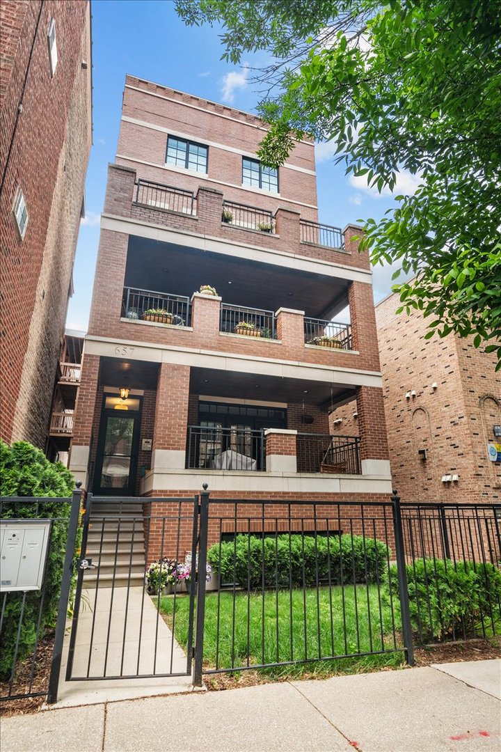 Lucky for you this awesome place will hit the market with showings starting this week. This is truly a find! This spacious 3-bedroom, 2-bathroom condo sits on quiet, tree-lined Melrose Street in beautiful East Lakeview. The over-sized lot provides an extra-wide and extra-long inviting floor plan.  A true cooks kitchen with white custom cabinets, quartz countertops, custom backsplash, large island and stainless steel appliances. The open concept allows for an abundance of light throughout. You will love the millwork and the overall attention to detail, it truly elevates the space! Lovely living/dining room with a gas fireplace, gorgeous built-in shelves, a wet bar with a wine fridge, and sliding glass doors to a stunning private terrace, perfect for entertaining. The primary suite has a luxurious bath with double vanity, heated floors, steam shower and body sprays and a custom organized walk-in closet. Two additional bedrooms and a full bath, both good sized and with pretty finishes. In-unit full-sized washer and dryer and great storage. In-ceiling speakers throughout the home and terrace. Separate storage closets near the garage, in addition to an on-site storage shed, perfect for strollers, bikes, and more. Heated garage space included. Close proximity to  restaurants and coffee shops on Broadway, Belmont, and Halsted, with the Saturday farmers market just down the street! This popular neighborhood is in the heart of everything! Do not miss !