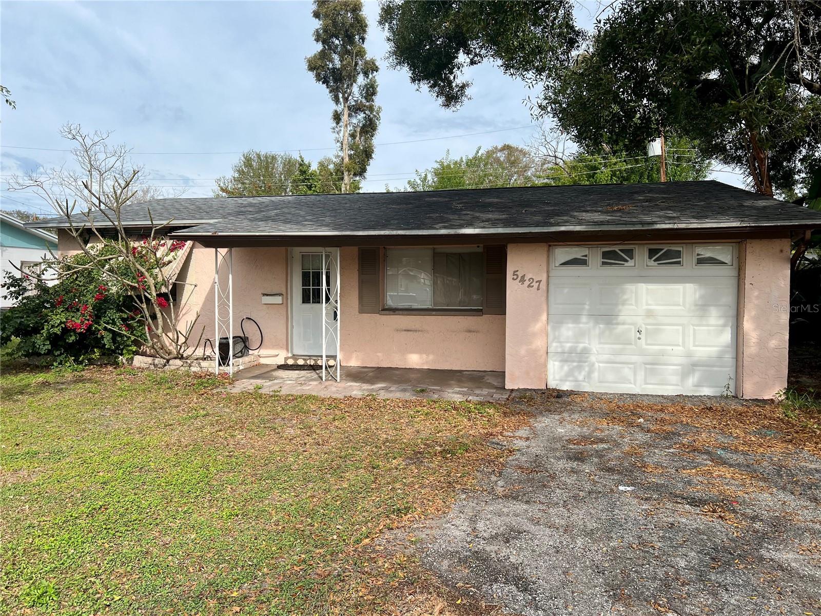Looking for ample space and multiple bedrooms? This block-built home, situated in a NON-FLOOD ZONE at the center of Pinellas Park, features 4 bedrooms and 2.5 bathrooms. It includes an office, den, or playroom, an enclosed lanai, and room for boat or RV parking. With over 1600 heated square feet the primary bedroom offers an ensuite bath and a walk-in closet, and per owner: 2024 water heater, 2020 Trane central air conditioning, 2017 roof, and fully replaced hot water line. The home also boasts an indoor laundry room and a spacious dining area. Half of the garage currently converted into an office can be easily restored to a full garage. Conveniently located near schools, libraries, shopping centers, airports, and world-renowned beaches, this property is also close to Trails End Stables, Pinellas Park Performing Arts Center, Skyview Recreation Center, and Skyview pool with splash pad and picnic facilities—enhancing the lifestyle this exceptional location provides.
