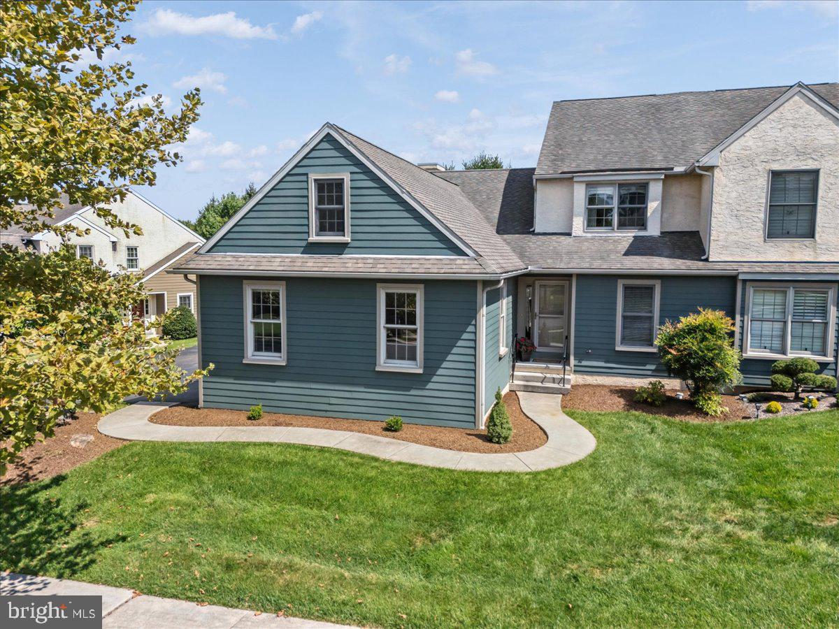 This exquisite end-of-row townhouse, located in the desirable Parkside subdivision, offers a harmonious blend of modern living and classic architectural charm. Built in 2004, this residence features three spacious bedrooms and two and a half bathrooms, ensuring ample space for both relaxation and entertainment. The interior showcases a thoughtful design with solid hardwood flooring, plush carpeting, and ceramic tile, complemented by crown moldings and recessed lighting throughout. The eat-in kitchen is equipped with high-quality appliances, including a built-in microwave, double wall oven, dishwasher, and electric cooktop, making it a culinary enthusiast's dream. The combination dining and living area, highlighted by a cozy gas fireplace, creates an inviting atmosphere for gatherings. The master suite boasts a bathroom with a stall shower and walk-in closet, while additional bedrooms provide flexibility for guests or a home office. A partially finished basement offers potential for further enjoyment and storage. Residents benefit from a well-maintained community with services including lawn care, snow removal, and common area maintenance. The neighborhood is conveniently located near the Livingood Park, and enjoys modern amenities such as public water and sewer - enhancing the overall quality of life. With an attached two-car garage and additional driveway space, parking is both convenient and accessible. This property represents an exceptional opportunity to enjoy a laidback community lifestyle while residing in a beautifully appointed home.