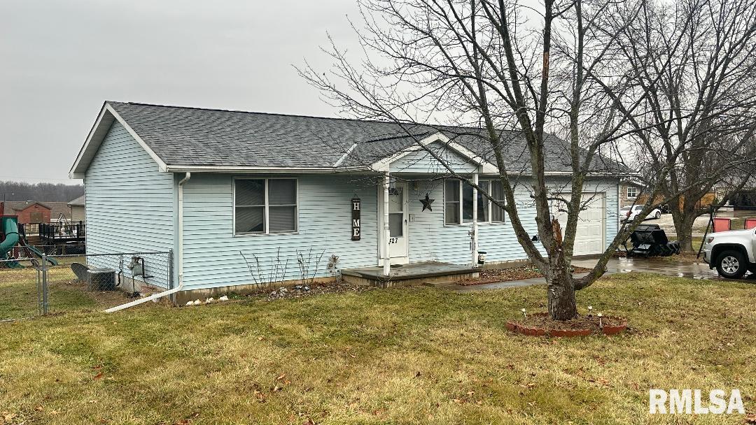 2-bedroom, 2-bath ranch with a 1-car attached garage situated on a large corner lot with a fenced backyard. One of the main-floor bedrooms was converted into a spacious bathroom, creating an oversized primary bath; this space could be converted back to a bedroom if desired. Functional layout with flexibility for future changes and a great opportunity for buyers looking to personalize the space. Convenient location with easy outdoor access.
