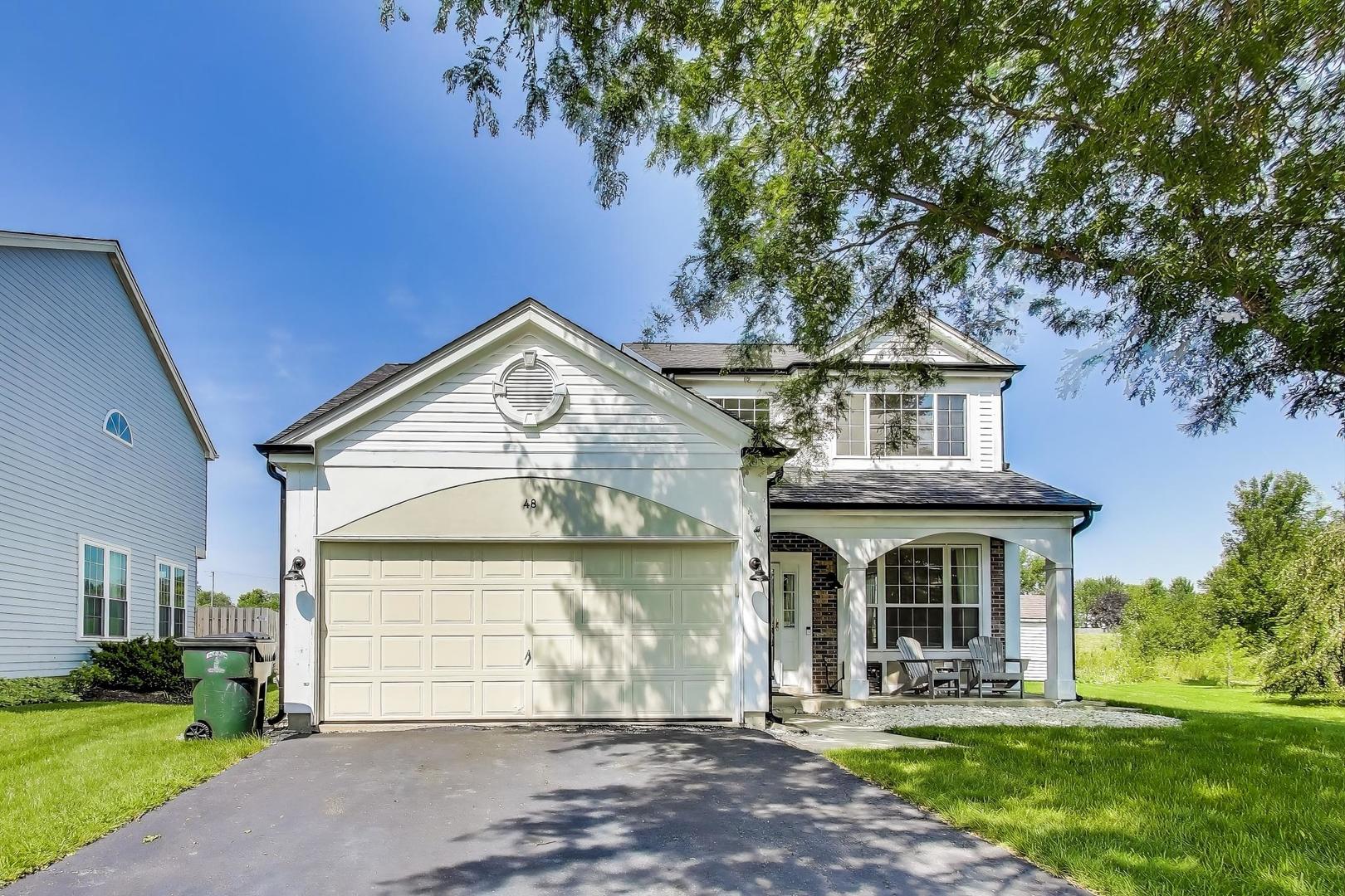 Discover this stunning 3-bedroom home nestled on a tranquil residential street in the highly sought-after Cambridge subdivision.  Located on a prime cul-de-sac, this property offers unparalleled privacy. The first floor welcomes you with a spacious living room and a dining room bathed in natural light. The bright family room, featuring a cathedral ceiling, is perfect for entertaining and seamlessly flows into a large kitchen equipped with all stainless steel appliances. Enjoy meals in the sunlit dining area with a sliding patio door that opens to a cozy backyard. Completing the first level are a powder room with a window, a convenient laundry area, and a large mudroom/storage room.    Upstairs, the master suite impresses with a vaulted ceiling, a generous walk-in closet, and a luxurious master bath featuring a separate shower, soaking tub, and dual vanities. Two additional bedrooms and a hall bath complete the second floor. This home is further enhanced by recent updates, including a new roof, gutters, and siding (June 2023), a newer furnace with humidifier (July 2021), a newer AC unit (July 2021), a new refrigerator (February 2024), and a newer washer/dryer (January 2023). Hardwood floors and an abundance of natural light grace every room. Additional features include a two-car garage and so much more! Enjoy proximity to Cambridge Country Park Trail, playground, park, and lake, as well as nearby shopping, restaurants, and schools.