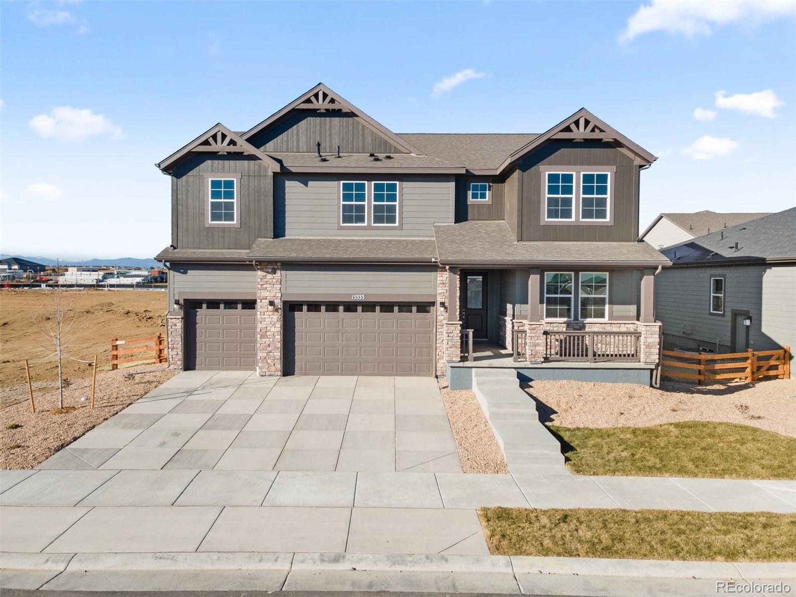 This exceptional estate home is the largest offering in the collection and a rare find in new construction. Designed to impress, the dramatic two-story great room features soaring ceilings and walls of windows that flood the space with natural light, along with a stunning floor-to-ceiling tiled fireplace as its focal point. An open loft overlooks the great room, adding architectural interest and an expansive feel throughout.With 3,524 square feet of living space plus an unfinished basement ready for future expansion, this home offers incredible scale and flexibility. The spacious main level includes a private bedroom with an attached bath, as well as an additional powder room, perfect for guests or multi-generational living.The oversized kitchen and dining area are ideal for both everyday living and entertaining, featuring abundant cabinetry, upgraded gas stainless steel appliances, a massive center island, and an impressively large pantry. Step outside to the covered patio for seamless indoor-outdoor living.Upstairs, you'll find four generously sized secondary bedrooms, including one with its own private bath, plus a hall bath and an open loft space. The luxurious primary suite is complete with a spa-like five-piece bathroom.A standard four-car garage, high-end finishes, dramatic ceiling heights, and thoughtful design throughout make this home truly one-of-a-kind. Rarely does new construction offer this level of space, grandeur, and functionality.Talon Pointe is located 4 minutes to E-470 allowing maximum accessibility to the city, mountains, DIA and lots of great shopping and dining. Massive community park and integrated trail system.  Come see us today!