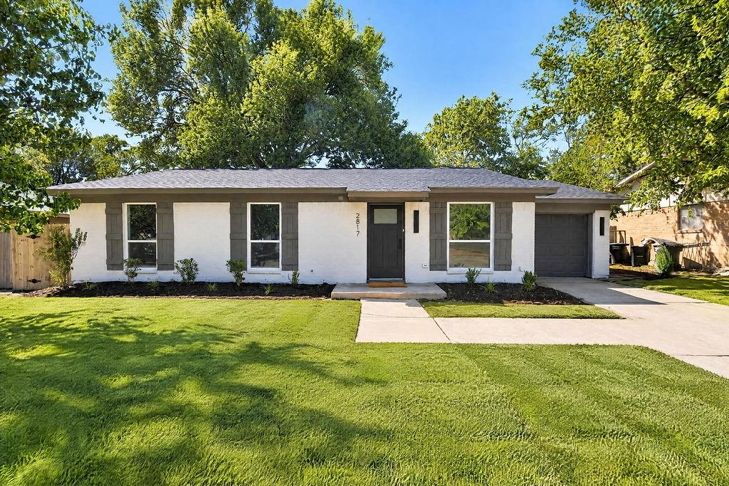 Welcome to this beautifully renovated property offering the perfect blend of modern design and ultimate peace of mind. Step inside to a bright, open floor plan highlighted by gorgeous new LVP flooring, sleek recessed lighting, and all-new ceiling fans. The true heart of the home is a large kitchen big enough to host family and friends, featuring beautifully updated cabinetry, stunning quartz countertops, fresh tile, new plumbing fixtures, and striking designer fixtures.Rest easy knowing the heavy lifting has already been done: this home boasts a brand-new roof, new windows, a new electrical panel, and foundation work complete with a warranty. Outside, fresh new landscaping welcomes you home. To top it all off, this incredible property is conveniently located just walking distance to the school!
