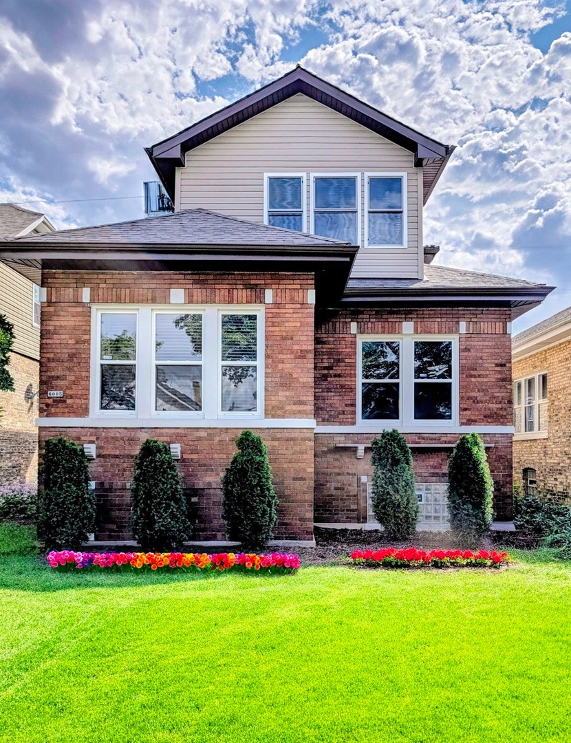 Discover a wonderful Chicago jumbo bungalow-beautifully expanded and thoughtfully updated-offering 7 spacious bedrooms and 3 full bathrooms. A luxury primary suite crowns the home with a massive walk-in closet worthy of a boutique. The entire upstairs was fully rehabbed in 2021, adding a brand-new walk-in closet, an elegant bathroom, a serene guest bedroom, and a convenient laundry room. In 2023, the kitchen was completely reimagined with custom new cabinetry, sleek quartz countertops, and stainless-steel appliances, delivering a refined culinary space that blends timeless craftsmanship with modern convenience.