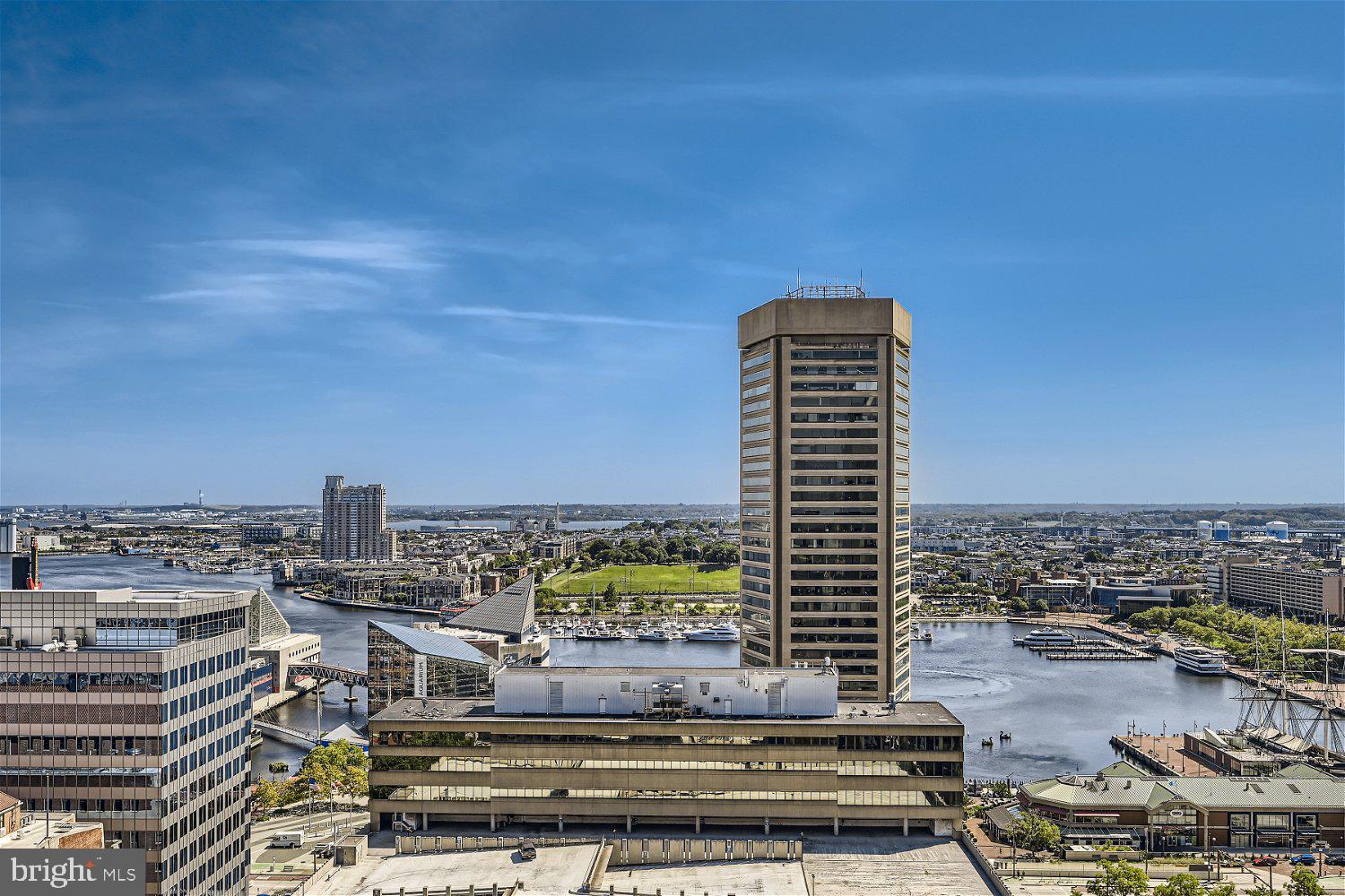 This stunning high floor south facing two bedroom two bath condominium offers an open floor plan filled with natural light and sweeping views of the Inner Harbor! Interior features include many upgrades including  hardwood floors throughout, upgraded kitchen with granite countertops and custom tiled bathrooms. The flexible living/dining room is perfect for daily living and entertaining with easy access to the private balcony with amazing views. Two spacious bedrooms including a primary bedroom suite with walk-in closet and private full bath with a custom tiled walk in shower and granite vanity.  414 Water Street offers residents full service amenities including 24-hour front desk staff, lobby security, outdoor swimming pool, event room, fitness center and business center. This residence comes with a highly sought-after storage room on the same-floor and an assigned parking space.  Live a turnkey lifestyle in the heart of downtown just steps to great dining, shopping, entertainment and minutes to I-83 and I-95. Available furnished. Price upon request.