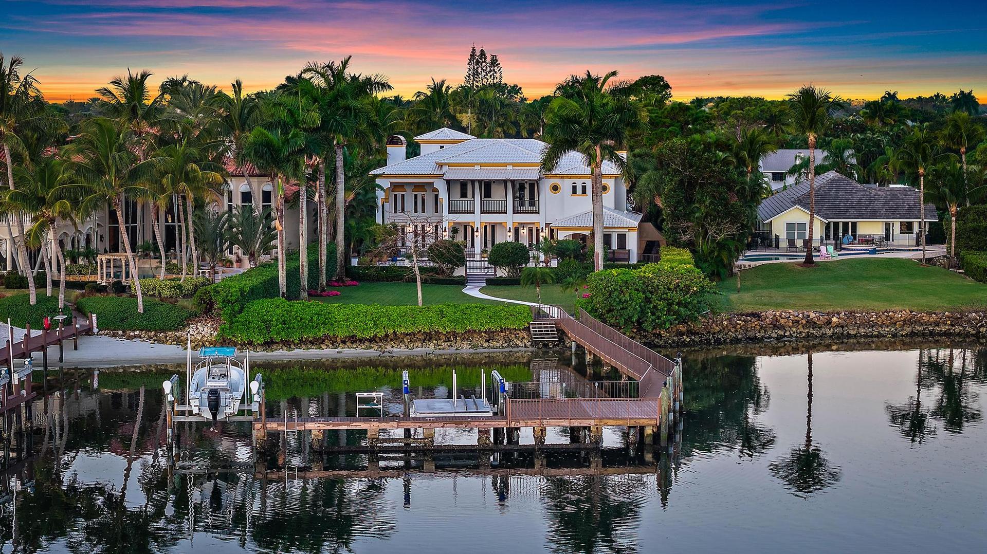 Exquisite Direct Intracoastal Estate! Palm Beach elegance located just north of Donald Ross Road with 98' of waterfront, an eastern rear exposure overlooking the intracoastal waterway and a private preserve on the opposite side of the waterway, this is a very unique opportunity for a custom waterfront estate in Palm Beach County. Designed and built by the current owner, this home has very specific and detailed finishes from the layout and design to the imported tiles and materials - no detail has been overlooked! Situated on over 2/3 of an acre with a deeded dock, boat and jet ski lifts, a spacious yard on a quiet cul de sac, and one that should not be overlooked if one is searching for the slice of south Florida paradise. Dual master baths, guest house...this home truly has it all!