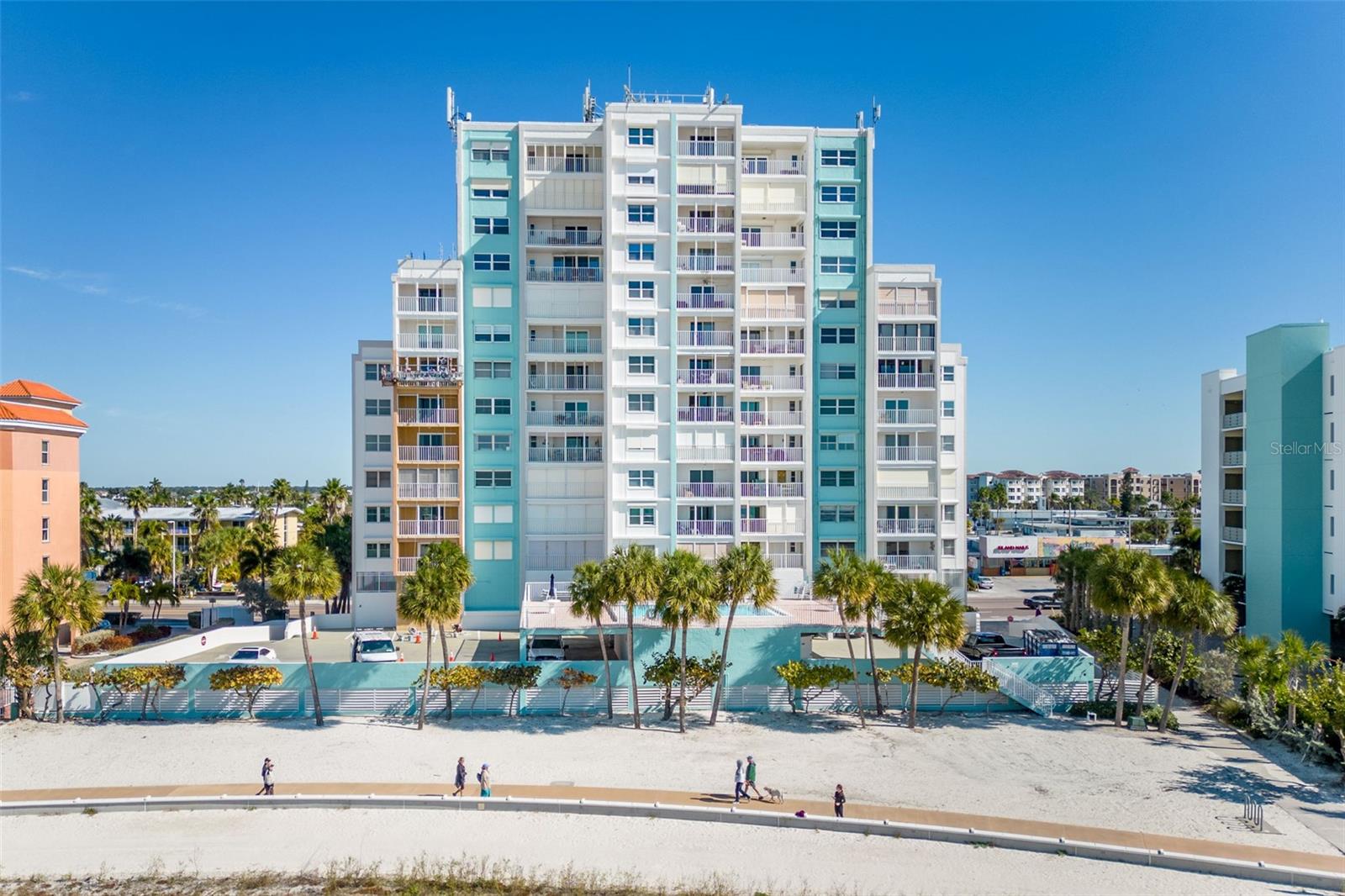 BEST VALUE DIRECTLY ON THE GULF! 
Welcome to the ultimate beach escape—a sprawling 1,650 sq/ft SW corner unit perched on the 10th floor of Treasure Sands, offering unmatched panoramic Gulf views from not one, but TWO private balconies. This is your chance to own one of the largest direct beachfront condos on Treasure Island—and it’s move-in ready!

Light, bright, and breezy, this beachside beauty features a huge living and dining area, 3 bedrooms, 3 full baths, in-unit laundry, and generous walk-in closets. The master suite is a dream, with an en-suite bath and balcony access to soak in nightly sunsets and dolphin sightings.

Treasure Sands is a well-managed, milestone-approved building with no upcoming assessments, elevated amenities like a solar-heated beachfront pool, secure entry, under-building parking (Space #23), and private storage. Plus, the HOA gets a major boost from $110K+ in annual rooftop rental income—a rare find that helps keep dues low and reserves strong.

 Watch the Sanding Ovations Festival, kite shows, and breathtaking sunsets right from your balcony. Whether you're looking for a full-time beachfront lifestyle or a luxe second home, this is the one that checks every box.

 HOA includes high-speed internet, cable, and more.
 Don't miss this opportunity to live on one of Florida’s widest, most iconic beaches—schedule your private showing today and start living the dream!
