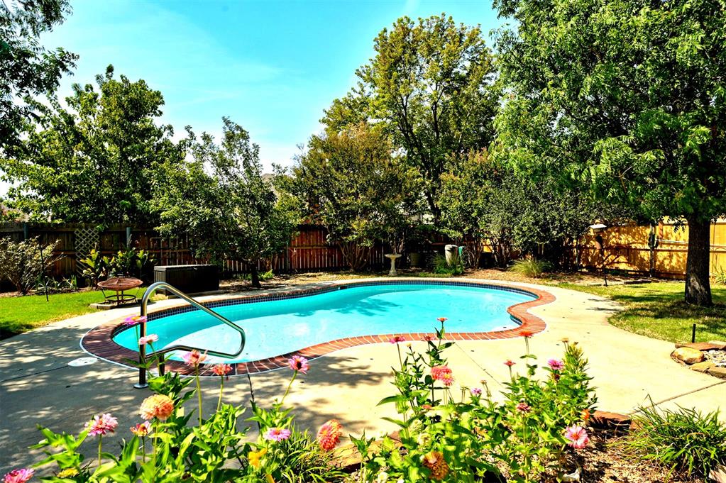 WOW! Your private oasis awaits in Castlerock! Discover the charm of 4100 Drawbridge Lane, a beautifully maintained home built by McShae Properties, one of Norman's premier builders. This inviting residence, with approximately 1,900 square feet, offers a tranquil retreat featuring an inground swimming pool, creating your own personal backyard oasis! This home features 4 bedrooms or 3 bedrooms plus an office, providing ample space for your family’s needs. Enjoy 2 spacious bathrooms designed for comfort and convenience.  The open-concept living and dining area is bathed in natural light, with large windows overlooking the serene pool area—perfect for those who love to nurture plants and enjoy a bright ambiance.  Recent Updates include  new exterior paint, fresh interior carpet and pool pump  This home is truly move-in ready, allowing you to settle in with ease.   For added peace of mind during inclement weather, the home includes a walk-in safe room closet.  Explore the beautifully landscaped yard featuring raised beds for your favorite vegetables, herbs, or flowers. Enjoy relaxing in the shade of mature trees, swinging with a mocktail in hand at the end of the day. As part of the Castlerock neighborhood, residents enjoy access to a community pool, lake, and scenic walking paths, enhancing the lifestyle you desire. Centrally located, this home provides easy access to shopping, restaurants, I-35, and is just a short drive to the University of Oklahoma and Tinker AFB, making it perfect for commuters and or work from home alike. Don’t miss your chance to own this exceptional home in a highly desirable neighborhood. Schedule your private tour today and experience the lifestyle that 4100 Drawbridge Lane has to offer!