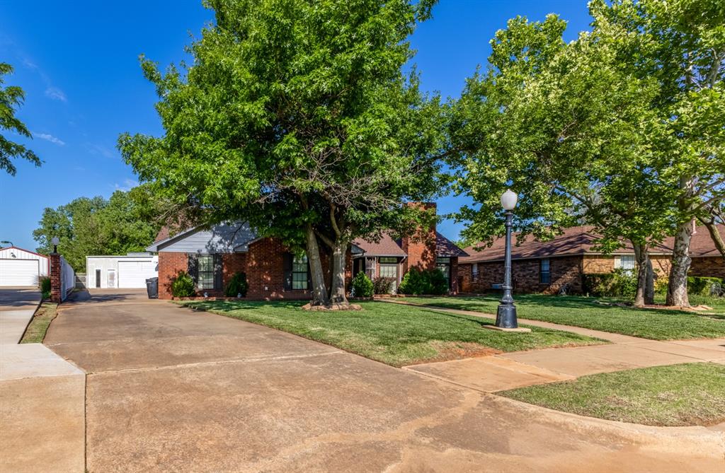 Let's talk SHOP!! Need a place for classic cars? Do you do mechanic stuff? Want the ultimate mancave? Or does she need a place to craft? Tired of renting a storage building? Park the RV and boat HERE! Cancel that storage fee! This home has a 1300 sq ft SHOP with 3 garage bays (one with oversized door), 15' ceiling, AND all the things! This shop has electricity, loads of outlets, an air line, insulation, a heater, & a heavy-duty ceiling-mounted I-beam and adjustable engine hoist. This is ideal for mechanics, DIY enthusiasts, and heavy lifting projects. It's all right HERE in Moore, just a short walk from Buck Thomas Park. With the recent $150K+ professional remodel in the house, the current owner did the hard stuff for you, and it is gorgeous! Professionally remodeled baths with walk in showers, granite countertops, new lighting, and the most beautiful tile. The kitchen counters, backsplash, appliances, flooring, lighting fixtures, and plumbing fixtures have all been replaced. The interior has been painted throughout in designer colors. You will LOVE these light & plumbing fixtures. Plantation shutters throughout. The living room is spacious w fresh paint, a fireplace, & a vaulted ceiling. It flows seamlessly into the oversized sunroom (with hvac). This room can be used for anything (family room, pool table, game room, pet room, man cave, home school, home gym, you decide). It's a plant lover's dream. The wall of windows in the sunroom provides the perfect view of the inground pool (liner replaced 2024). 3 oversized bedrooms, 2 completely remodeled baths, Study, Sunroom, and a 3 car attached garage with a standing storm shelter! The pool had a heater at one point & there was a gazebo w plumbing (now torn down & capped off). Those items could possibly be restored, but not by this current owner, & they never used them. Those items are "as is". The shop building is loaded with extras, but sold as is. This owner has not used any of it.
