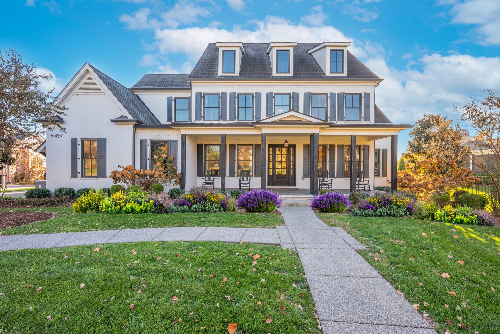 Exceptional Custom Home with Outdoor Oasis.  This bright and expansive two-story residence offers a perfect blend of elegance, comfort, and versatility. Thoughtfully designed, the home features six spacious bedrooms, five full baths, and one half bath to accommodate modern living.  The dramatic Great Room showcases soaring windows that fill the space with natural light, complemented by a loft, bonus room, formal dining area, and private study—ideal for both entertaining and everyday life. The main-level primary suite provides a luxurious retreat with two generous walk-in custom closets and a spa-inspired bath.  The gourmet kitchen flows seamlessly into the Great Room, creating an inviting setting for gatherings. Step outside to an impressive covered patio featuring travertine tile, a fully equipped outdoor kitchen, fireplace, and automatic screens for year-round enjoyment.  A spacious three-car garage completes this elegant home, combining timeless design with exceptional livability.