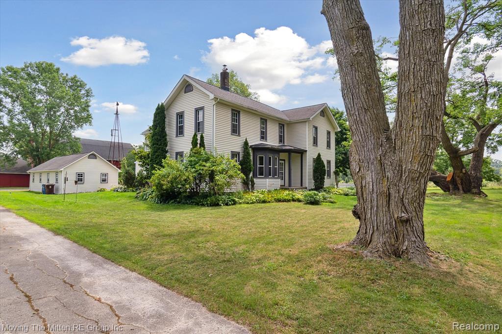 **OPEN HOUSES SATURDAY AUGUST 23 NOON-2PM** A rare opportunity to own a restored farm home on 5 fabulous acres of land with lower Pittsfield Township taxes and Ann Arbor Schools. This stunning home with 5 bedrooms and 2 full baths features these main floor conveniences: a spacious island kitchen with a breakfast bar, tons of cabinet storage, and maple wood flooring. A south facing sunroom off the kitchen with a doorwall that leads to a wood deck for summer enjoyment. A large living room and an office for those who work from home. In addition, a main floor bedroom that could also be a second office. Plus a remodeled full bath with a euro-style shower, laundry, and a big mudroom off the backdoor. Mostly wood flooring throughout.  Upstairs, a big loft area, an enormous main bedroom with a WIC, plus 3 additional sizable bedrooms all with good closet storage. Also an updated full bath with a tub/shower combo.  This property was a former Alpaca farm and could be a great opportunity for a horse enthusiast or anyone who wants a place away from the busyness of the city, yet just a few minutes from downtown Ann Arbor, U of M, both University Hospital and St. Joe’s Hospital, freeways, etc. There are also several fenced paddocks ready for one who wants to own farm animals. 
A 20x40 garage that has a connected office. Outbuildings that include a 40x80 barn with a drive up hayloft that could also be used for equipment storage, plus 3 other large buildings for storage. Numerous renovations have be done throughout the years. Too many to mention. Please contact the listing agent for a list. Public water and septic. Sellers will provide the Washtenaw County TOS letter at closing. This is a beautiful home on land that can be enjoyed for years to come!