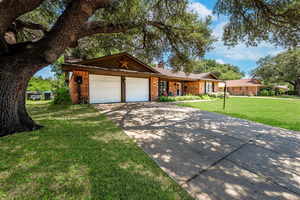 Welcome to this charming 3 bed 2 bath brick home, located right off South Dr in Fort Worth, minutes from TCU campus and Hulen between Chisholm Trail and 820. Owner just added over 45k in renovations including 20k in granite! The home is situated on a generous interior lot with mature trees and tasteful landscaping lending shade and beauty. As you walk into the foyer, the open concept living to the left leads you past the fireplace into the kitchen, the windows and sliding glass doors provide plenty of natural light. The oversized primary bedroom is to the right, with his and her walk-in closets, double vanity, garden tub and shower. Matching granite throughout the entire home. A second split bedroom is located in the front with additional full bath in hallway. Also features a walk in closet. Large eat-in kitchen, with granite countertops and ample counter space with built-in cabinets. The wood burning fireplace with granite hearth is great for relaxing or entertaining with family and friends. The fenced backyard has a large covered patio. House is meticulously cared for. New upgrades include two added media walls, fresh paint, new floors, Fresh Paint, Large Granite Breakfast Table included. Large Pantry, New Barn Door, new water heater. Over 5k worth of Pecan Wood, 3 Seasons.
Fridge is Negotiable.