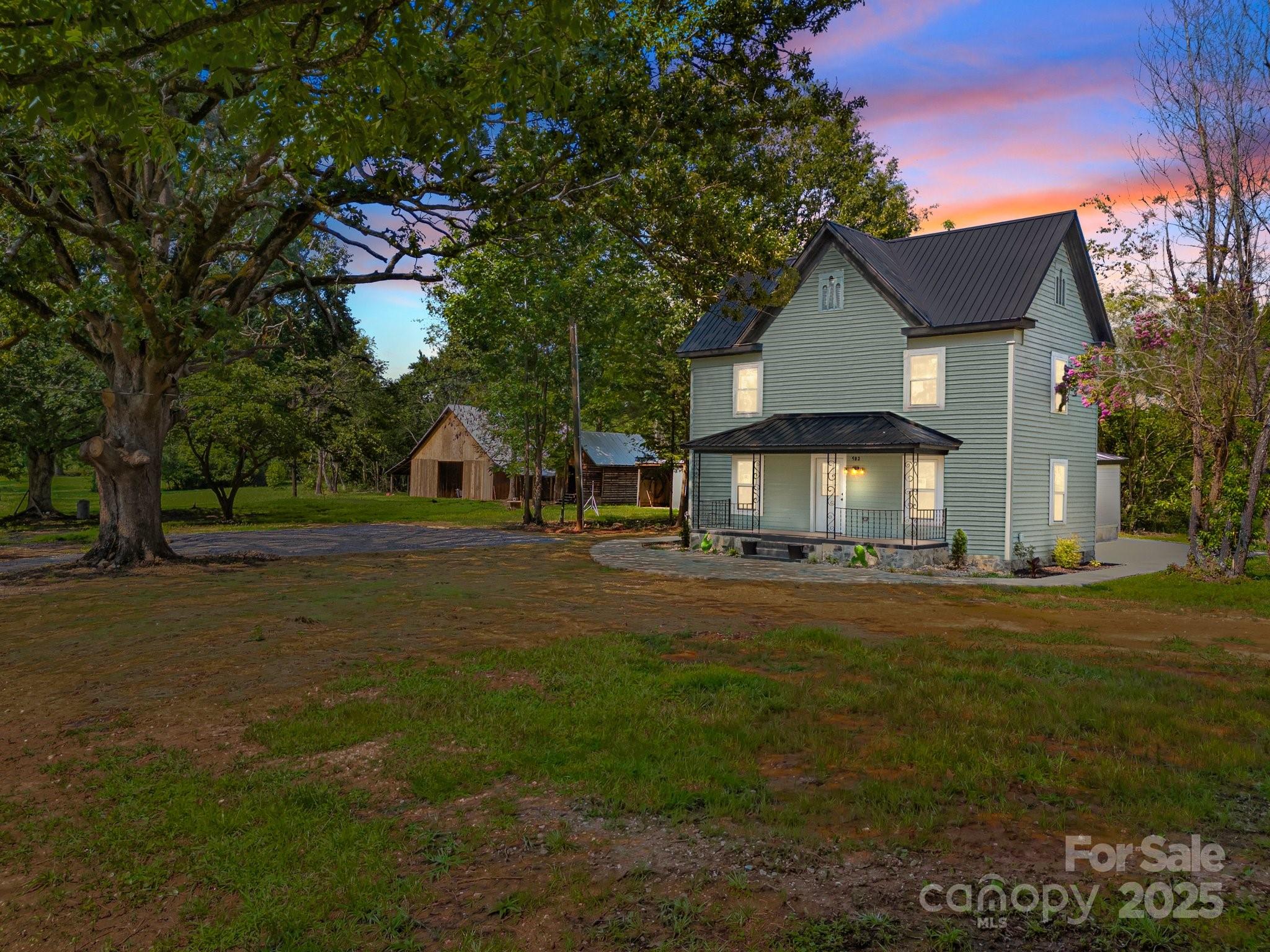 Dreaming of an old farmhouse with land, a workshop, and possibilities? This completely renovated 1890's farmhouse sitting on 2.79 acres has been given new life and is waiting for you. Walk onto a relaxing porch & into a welcoming living room w/new flooring and lg windows. A stunning full BR w/ tub/shower combo is off of the living room. The lg windows in the DR allow for natural light highlighting the striking tile flooring which flows into a lg kitchen w/a gorgeous butcher block countertop resting on natural wood cabinets. The laundry room is located off the kitchen. In addition to a beautiful full ensuite w/a tub/shower combo, the oversized primary bedroom has a cozy sitting area, and a walk-in closet. The upstairs has 2 bedrooms and a lovely full bathroom w/a shower. This property also has multiple outbldgs: a barn, a she shed/garden shed, a metal bldg, and a 3,000 SqFt wkshop w/2 separate sets of drive throughs, workbenches, shelving, & office space. Start your business!