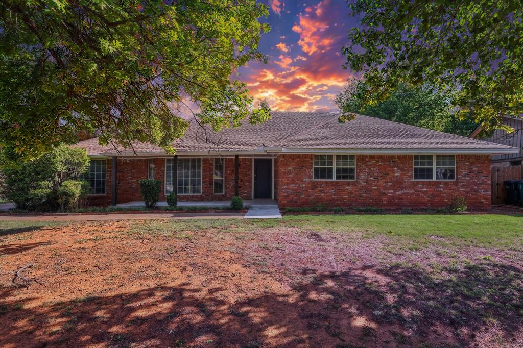 Prepare to fall in love with this absolutely stunning, renovated home, blending some classic with modern. Upon entry, you’re greeted with a classic entry and wainscot. Step into open living and dining spaces, all highlighted by beautiful luxury vinyl plank flooring, upgraded fixtures, barn doors, and an abundance of natural light. Up front, a flexible formal space easily transitions through custom stained barn doors into the office or formal dining. Main living area centers around a true wood burning fireplace flanked by built-ins and an open view into the chef-inspired kitchen. Whether you love to cook or entertain, you’ll appreciate the quartz countertops, stainless steel appliances, convection cooking, and a beautiful rustic hutch, adding a unique touch of style and storage. The primary suite serves as the private retreat, complete with a generous walk-in closet and a sleek, modern ensuite bath featuring counter space, head knocker and shower! Three additional bedrooms provide everyone with ample room to spread out! One bedroom is uniquely suited to handle your private library collection or a craft/hobby room. Practicality meets great design in this oversized laundry room, fully loaded with a built-in mud bench, half bath and an expansive walk-in pantry. Your outdoor arrangement provides some challenging slates for the landscape guru! A large amount of churn in these flowerbeds to make the curb appeal the envy of the community. A fresh new front porch, updated guttering, professional piers, unique and private back entry garage, along with more storage than you can dream of! Check out the 3D and video tours! Then call a REALTOR® to schedule a private viewing and make this house your home!