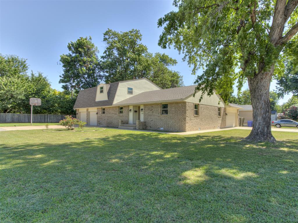 PRICE REDUCTION DON'T MISS THIS ONE! 
Charming Campus Beauty or Multi-Family Home Ready for Occupancy! This property offers a fantastic opportunity for both owner-occupants and investors seeking a solid income-producing home. Featuring 4 spacious bedrooms and 2 full bathrooms, it’s designed to accommodate both comfortable living and versatility.Two bedrooms and a full bath are located on the first floor, with professionally refinished hardwood floors throughout the entryway, living room, and two large bedrooms. The first floor also showcases custom oak cabinetry, solid oak and ash trim and doors, a cedar-lined entry closet, surround sound wiring, and a custom oak media cabinet. A cozy, efficient wood-burning stove completes the space, with fresh texture and paint throughout.The kitchen, bathrooms, and laundry room have all been beautifully updated with quartz countertops and durable tile flooring. Upstairs, you’ll find two generously-sized bedrooms with walk-in closets, along with a versatile flex room, complete with built-in cabinetry—ideal for a home office, nursery, or guest room. At one end of the home, you’ll find an oversized two-car garage, while the opposite end offers an additional two-car garage, perfect for extra storage or workspace. Additional features include new exterior paint, all-new windows, a built-in in-ground storm shelter, a sprinkler system in the front yard, and a convenient laundry chute. Perfectly situated in a prime location, this home blends the charm of campus living with modern, high-end amenities. With too many updates to list, this is truly a one-of-a-kind property!