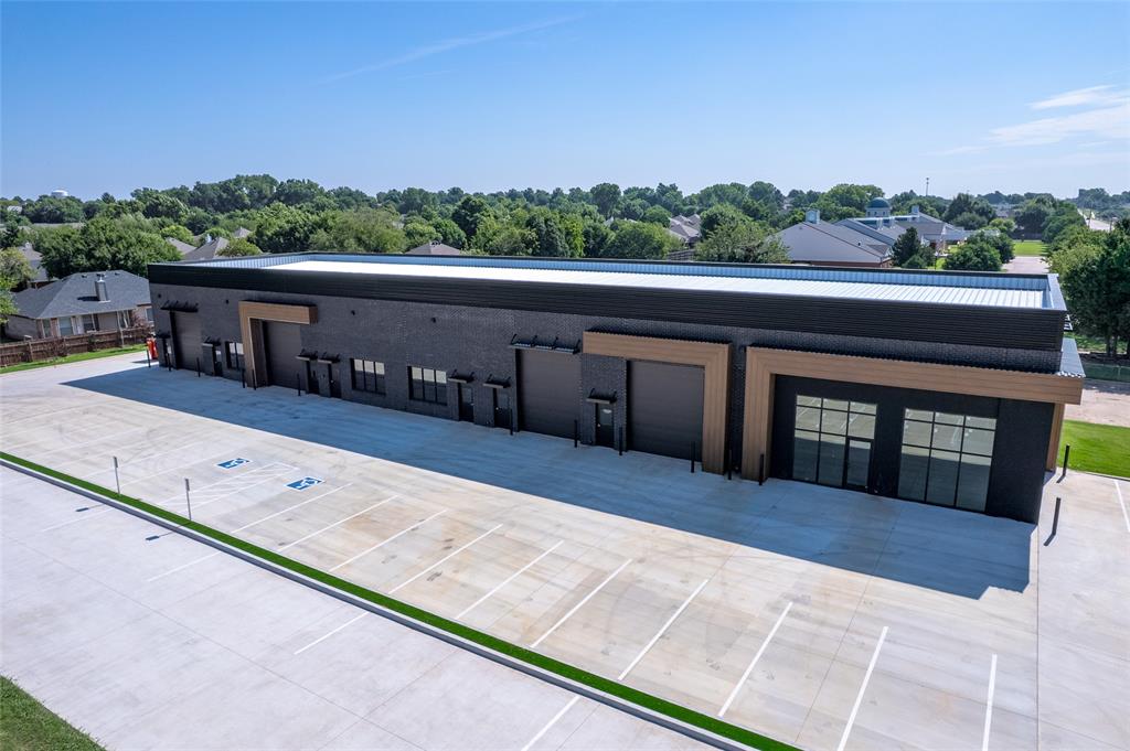 FOR LEASE! Studio Row is now complete and actively leasing! This newly constructed two-story brick office/warehouse development offers modern, fully climate-controlled spaces with ample parking and prime signage opportunities along Main Street. Zoned C-2, the property supports a wide range of uses and is ideal for professional offices with integrated warehouse space, retail storefronts, or other commercial operations. Three suites have already been leased, with limited availability remaining. Each unit features a black brick exterior, white oak-inspired finishes, oversized windows, and layouts that can be built to suit tenant needs. Conveniently located less than two miles from I-35 and three miles from Highway 9. Available suites: Suite 101-2,300-3,300 SF (MLS# 1154385), Suite 105-1,260-1,750 SF (MLS# 1190711), Suite 117-1,260-1,750 SF (MLS# 1190718), Suite 121/125-2,260 SF (MLS# 1190723). Suites 101 and 105 can be combined for 5,050 SF at $20/SF, while Suites 117 and 121/125 can be combined for 4,010 SF at $16.50/SF.