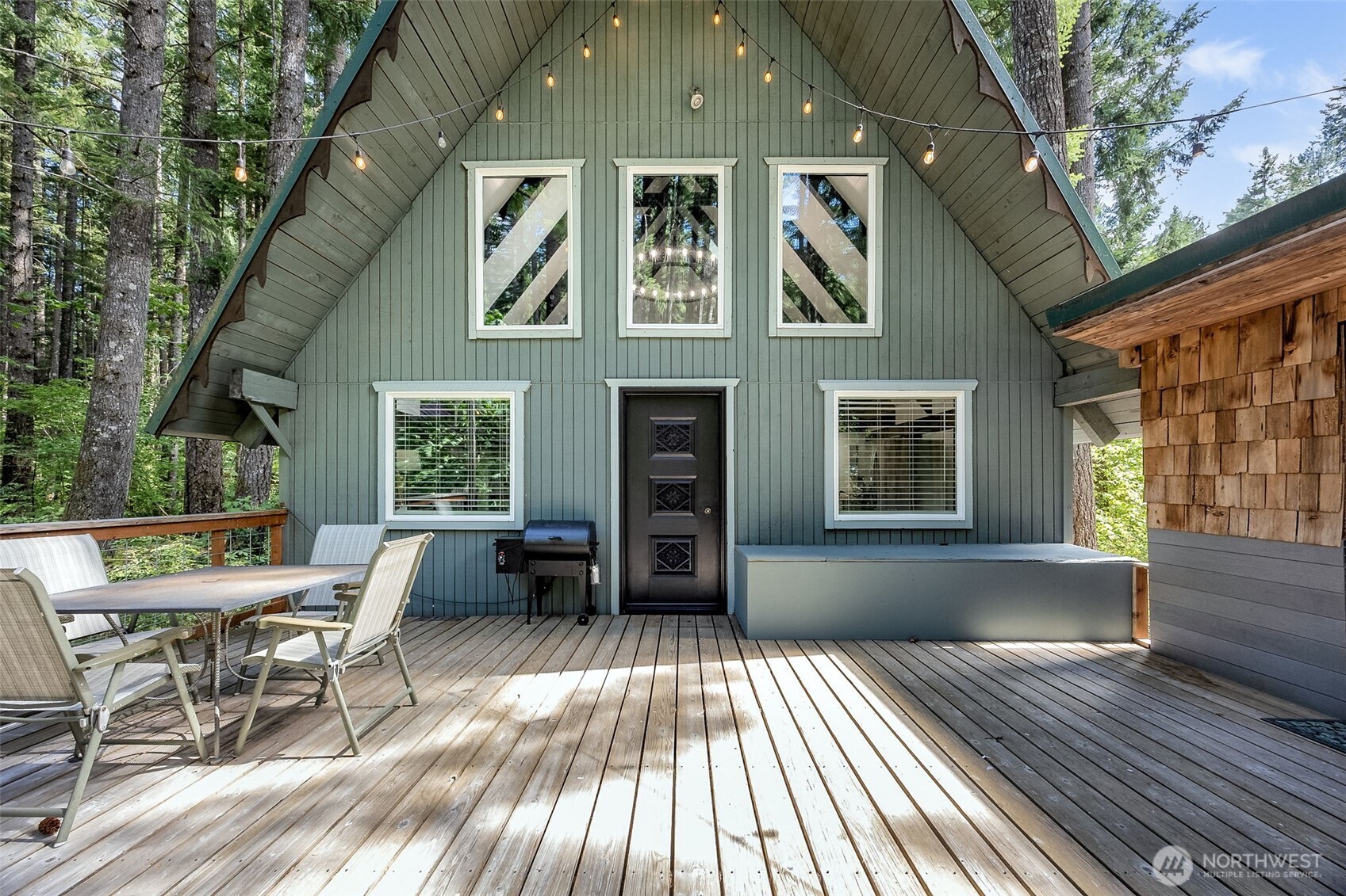 Welcome to this completely remodeled A-Frame in the heart of Packwood. Step onto laminate floors as you enter the wide open kitchen showcasing stainless steel appliances, butcher block counters & tile backsplash. Enjoy special aspects of this iconic architectural style like soaring ceilings, exposed wooden beams, built-in loft area & added sleeping nooks to maximize space for guests. Down the highway from White Pass Ski Resort, this is the perfect respite after a day on the slopes! Oversized deck, outbuilding for storage, fire pit area to enjoy the quietness of this mountain town! Located within the High Valley community with membership to the pool, golf & clubhouse access. Perfect for your mountain getaway or short term rental investment.