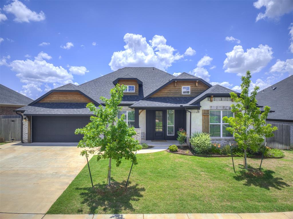 Modern Luxury Meets Everyday Convenience in Little River Trails

Welcome to this exceptional residence in the sought-after Little River Trails community—where design, function, and location come together beautifully. Situated on a generous 0.22-acre lot, this home boasts a rare 3-car tandem garage prepped for a Level 2 EV charger and is just minutes from Norman’s newest shopping destinations and the University of Oklahoma.

Inside, every detail has been thoughtfully curated. The open-concept floorplan showcases ceiling-height cabinetry, quartz countertops throughout, high-end appliances, and pull-out lower kitchen drawers for maximum ease and elegance. The living area features rich hardwood flooring and a sleek, custom 60” electric fireplace, creating a warm, modern ambiance.

Stay connected with Cat 6 ethernet drops in every room and enjoy the benefits of a tankless water heater and integrated smart technology throughout the home.

The luxurious primary suite offers a spa-like escape, complete with a jetted whirlpool tub, modern subway-tiled shower, oversized walk-in closet, and private water closet. A light-filled study with glass French doors, designer laundry room with soaking sink and folding counter, and a custom mud bench with upper cabinets add thoughtful functionality.

Upstairs, a flexible bonus room with powder bath can serve as a 4th bedroom, media room, or gym—and includes convenient walk-out attic access.

Enjoy outdoor living on the covered back patio with 200 sq ft of entertaining space, perfect for relaxing evenings or weekend get-togethers.

As part of this wonderful neighborhood, you'll have access to community amenities including a clubhouse, fitness center, pool, playgrounds, stocked ponds, and scenic walking trails. Welcome home!