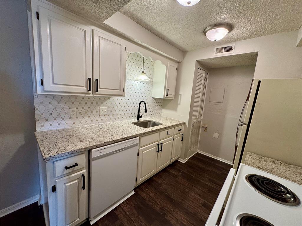 This Condominium offers a stylish and comfortable living environment. Remodeled 2-bedroom, 2-bath home located in Stratford Place Condominiums! Featuring modern lighting, updated paint, luxury vinyl flooring and new carpet in bedrooms. The kitchen and bathrooms boast elegant granite countertops and boho backsplash. Dedicated covered parking spot conveniently located next to unit. Situated on the second floor, this condominium includes a private patio, covered parking, and in unit stackable washer/dryer. Available now. Electric only. Water covered by owner. Gated community.
