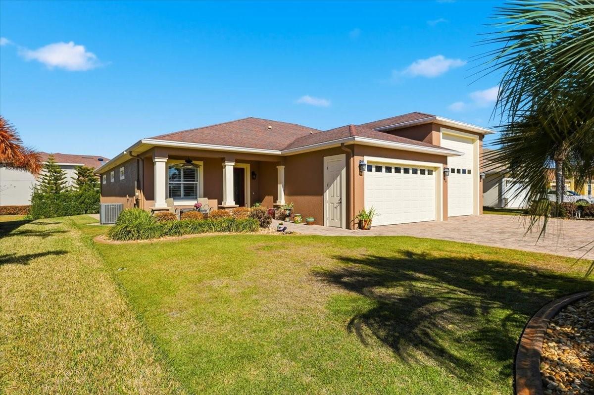 This exceptional residence boasts a number of desirable qualities, beginning with an enclosed RV garage. This provides secure and convenient storage for your recreational vehicle, protecting it from the elements and ensuring its longevity.Beyond the RV garage, the home itself offers a comfortable and stylish living space. It features two bedrooms and two bathrooms, along with a generously sized den or flex room that can be adapted to suit your individual needs, whether it be a home office, hobby room, or guest space. The exterior has also been recently painted, enhancing its curb appeal and ensuring a fresh, well-maintained appearance.The kitchen is a true highlight, equipped with a double oven and stunning quartz countertops. The large island provides ample workspace and serves as a natural gathering point. Plantation shutters throughout the home add a touch of elegance and provide excellent light control and privacy.Furthermore, the property includes a water softener, contributing to the overall comfort and convenience of daily living. And for enjoying the beautiful outdoors, there's a lovely lanai, perfect for relaxing and entertaining.I believe this property offers a compelling combination of features and value. Please don't hesitate to contact me to discuss this opportunity further.