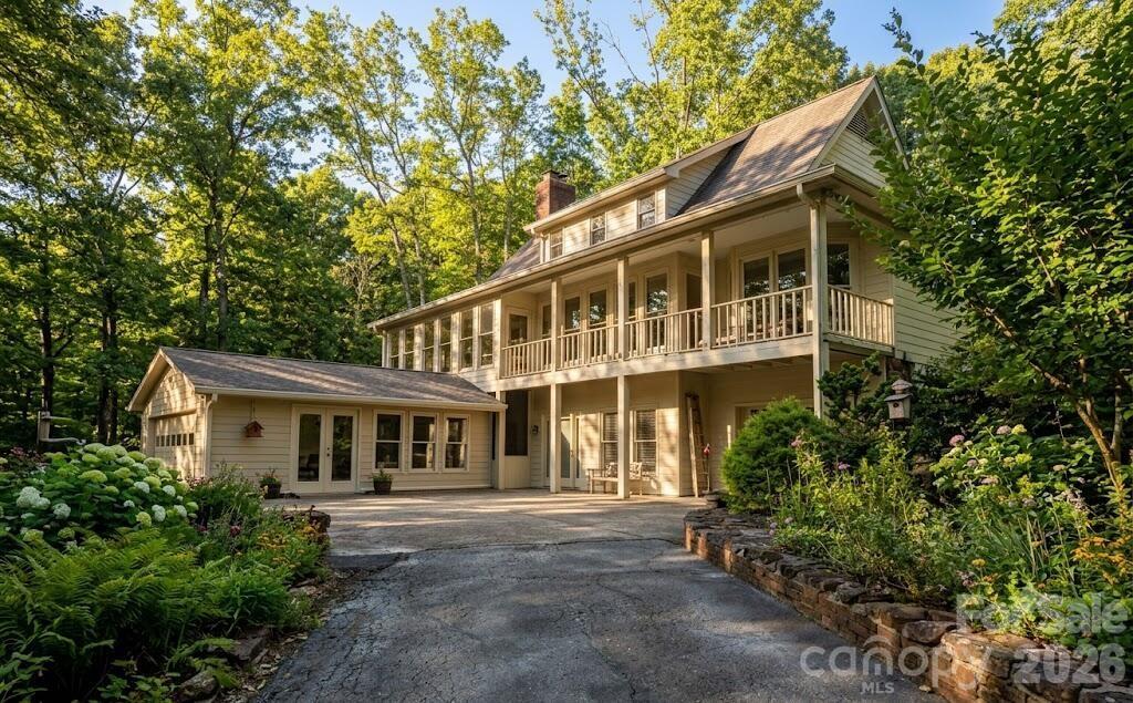 If you treasure privacy and nature, this is your spot! Relax and enjoy the natural beauty of this one of a kind home nestled on over 5 acres in popular Hunting Country. Cool off or swim "laps in place" in your own year-round indoor Endless Pool. An open concept kitchen with double wall ovens, ample quartz countertop, oversize cooktop, built in microwave and elevated fridge is accompanied by solid 3/4 inch Hickory floors thru out the main floor. Optional master on main. Upscale home with stunning details. A generous number of exterior windows allows amble sunlight throughout the home.  A total of 30 windows have been replaced along with many upgrades.  Relax and watch nature from the indoor sunroom patio or simply watch the horses on the nearby FETA trail. Recently serviced two zone heating system. The home is on a well and all electric. The Duke Energy average monthly bill for the past 12 months has been $117. The lower level has coffered ceilings, master suite with natural pine.