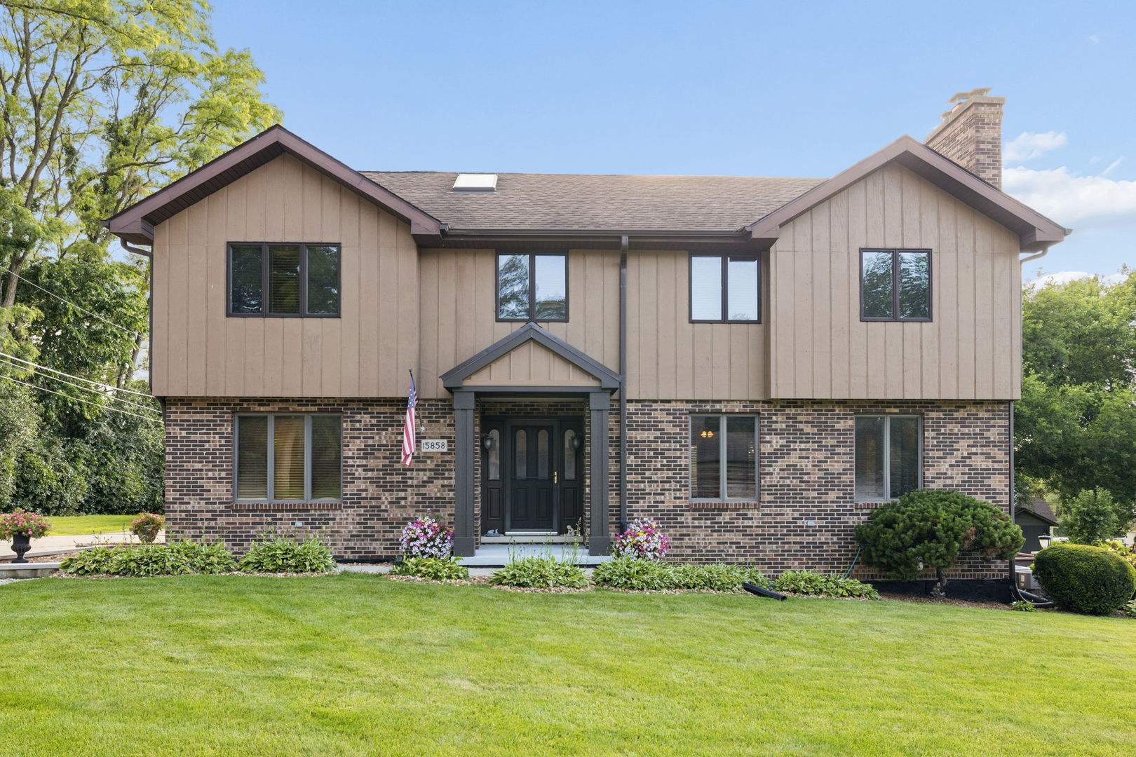 Welcome home to this well cared for, single family residence nestled on an oversized lot on a quiet dead end street in unincorporated Orland Park. Thoughtfully designed with quality custom details throughout, this home offers 4 spacious bedrooms, 3.5 bathrooms, and a full walkout basement. Step inside to a spacious foyer and an inviting, functional floor plan. The warm and welcoming living room features hardwood floors and a cozy gas fireplace, flowing seamlessly into the updated kitchen (with all new appliances!). Filled with natural light, the kitchen showcases beautiful oak cabinetry, granite countertops, a timeless travertine tile backsplash, stainless steel appliances, and generous space for a large dining table, perfect for everyday living and entertaining. Just off the kitchen, you'll find a versatile family room that can easily serve as formal dining, a home office, playroom, or additional gathering space. A convenient mudroom with custom built-in storage is located off the side entrance. The main level also features a half bath with the potential for an easy conversion to a full bathroom (see private broker remarks).  Upstairs, skylights brighten the hallway, leading to four generously sized bedrooms, each featuring walk-in closets. The spacious primary suite offers a walk-in closet with a private ensuite bath; complete with a whirlpool tub, separate walk-in shower, skylight, and plenty of space to unwind. The full walkout basement, complete with a full bathroom + soaker tub, offers storage plus endless possibilities for additional living, recreation, or entertaining while providing seamless access to the backyard. Step outside to enjoy pristine landscaping, mature privacy trees, and a beautifully maintained yard with plenty of room to relax, entertain, or play. The expansive deck, recently redone 2 years ago, is located just off the kitchen, creates the perfect setting for outdoor gatherings. Additional highlights include a new sump pump, new attic fan, whole-house fan, whole-house vacuum system, detached two-car garage, and an oversized driveway with abundant additional parking. Ideally situated in unincorporated Orland Park on a dead-end street, this exceptional home offers the perfect balance of privacy and convenience with easy access to shopping, dining, parks, expressways, and everything the area has to offer.