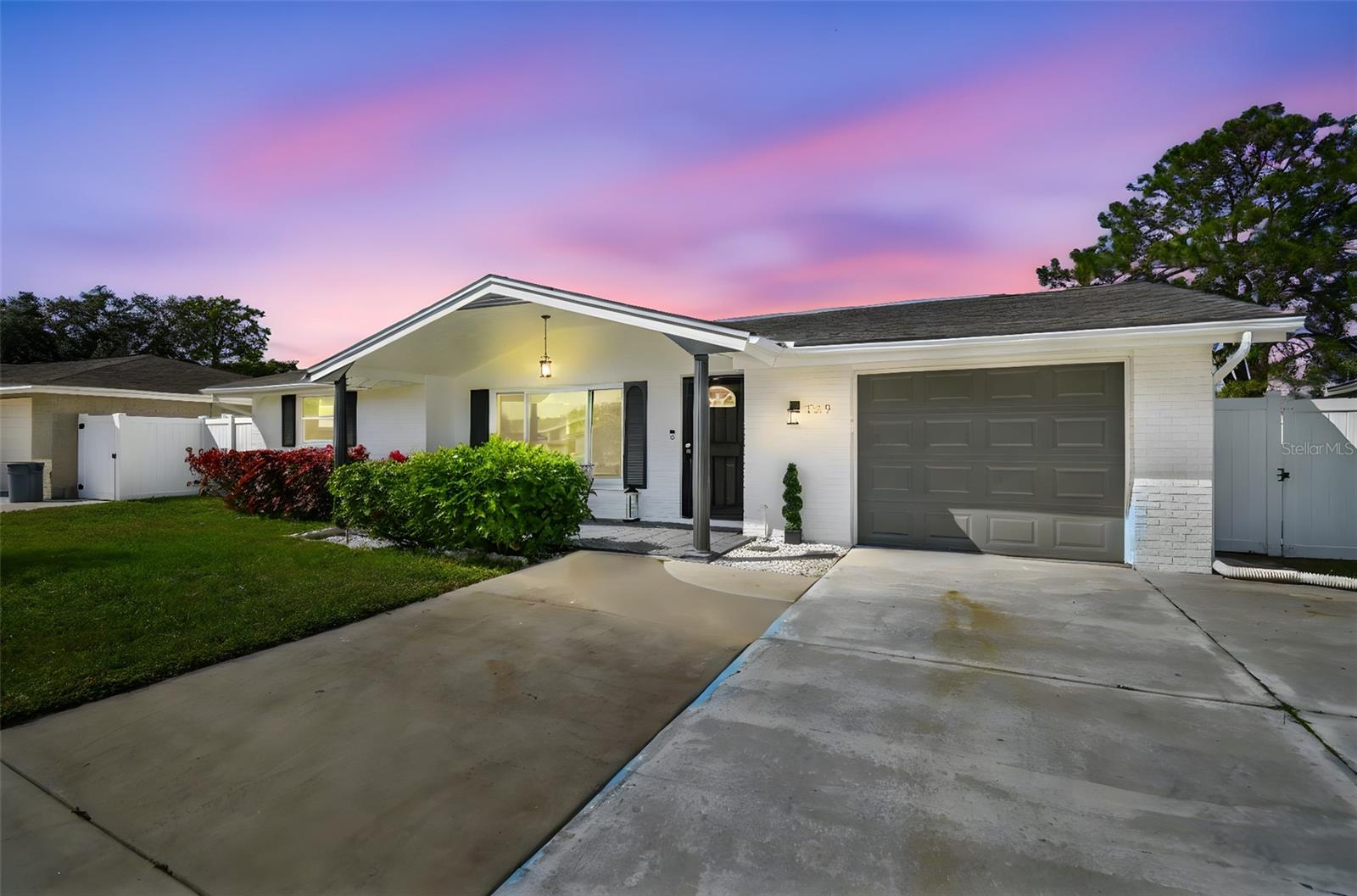 Welcome to 7519 Holly Lake Lane, a beautifully remodeled  3-bedroom, 2-bath retreat where modern comfort meets effortless Florida living.
Completely updated from top to bottom, this charming home impresses from the moment you arrive with gorgeous curb appeal, brand-new windows, and a sleek new sliding glass door that fills the interior with natural light. Step inside to an inviting living space featuring a fabulous modern open concept  kitchen with elegant granite countertops, new cabinets, a closet pantry, and a reverse osmosis system perfect for cooks and entertainers alike. The enclosed porch has been thoughtfully transformed into a cozy TV room, offering additional flexible living space.
Outside, enjoy your private, fully fenced-in yard complete with a covered pergola and an additional seating area with a hot tub ideal for relaxing evenings or hosting friends. Every inch of this home has been curated for comfort, style, and worry-free living for years to come.
A rare find that blends updates, charm, and outdoor enjoyment; this home is truly move-in ready and waiting for its next proud owner. Call and schedule your showing today.