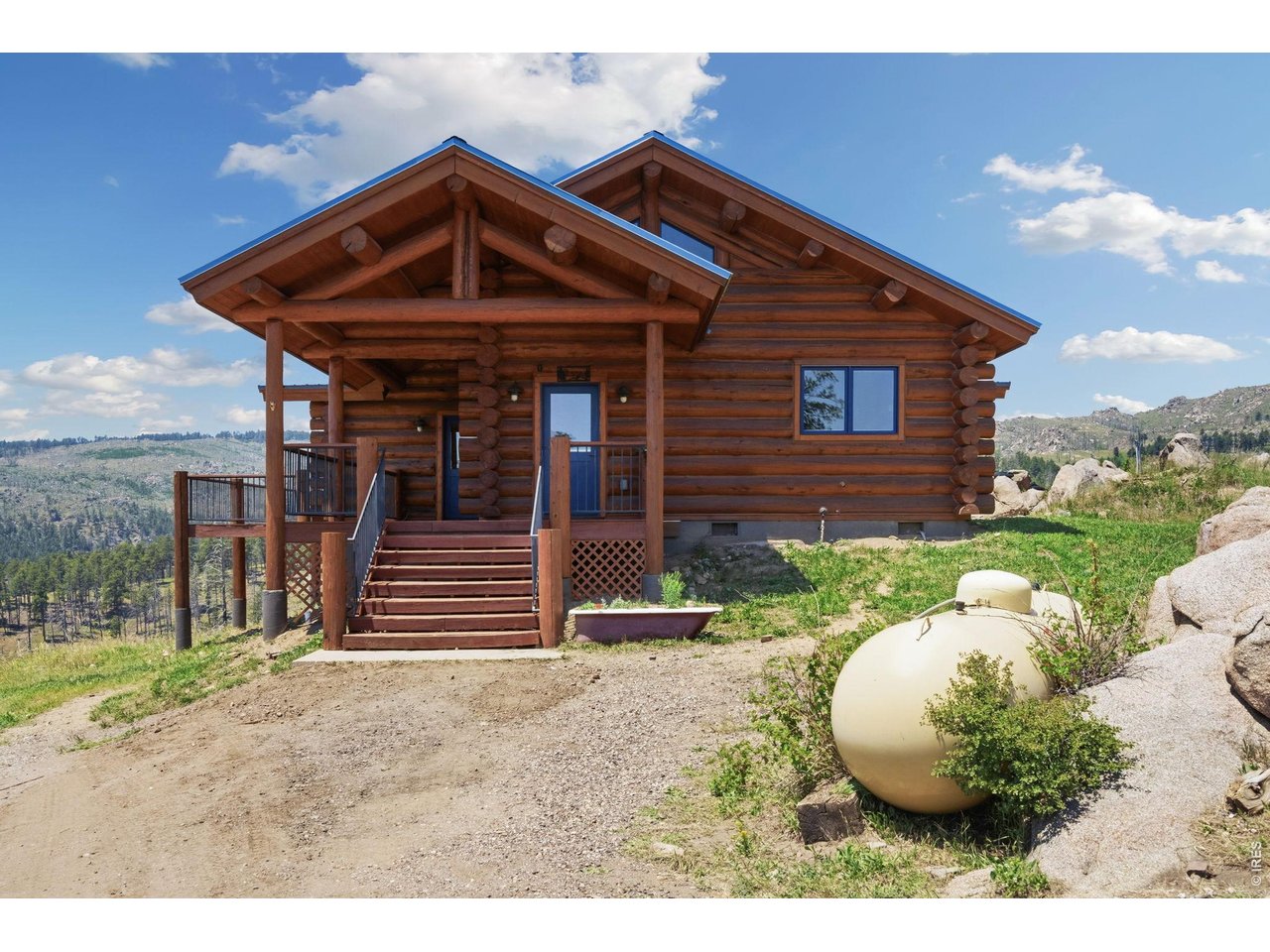 Tucked away on 6 private acres in the foothills of Bellvue, this exceptional property offers the perfect blend of privacy, luxury, and the peaceful lifestyle you've been dreaming of. Surrounded by towering pines, abundant wildlife, and incredible mountain scenery, this beautifully maintained home is a true Colorado retreat while still offering convenient access to Fort Collins. From the moment you arrive, you'll appreciate the pride of ownership and meticulous care that shines throughout. Inside, warm finishes, soaring ceilings, expansive windows, and an inviting open floor plan create a light-filled space designed for both everyday living and entertaining. The well-appointed kitchen flows effortlessly into the spacious living and dining areas, while every window frames stunning views of the surrounding landscape. Step outside and enjoy everything mountain living has to offer-from morning coffee on the huge deck to evenings spent under some of the most spectacular star-filled skies. With 6 acres, there's room to explore, relax, recreate, or simply enjoy the serenity and privacy that make this property so special. Need to work remotely? Starlink high-speed internet is available, making it easy to work from home without sacrificing connectivity while enjoying the beauty and tranquility of mountain living. Whether you're searching for a full-time residence, luxury mountain retreat, or the perfect Colorado getaway, this one-of-a-kind property offers the ideal combination of comfort, quality, and unforgettable natural surroundings. If you've been waiting for a home that truly embodies the Rocky Mountain lifestyle, your search ends here.