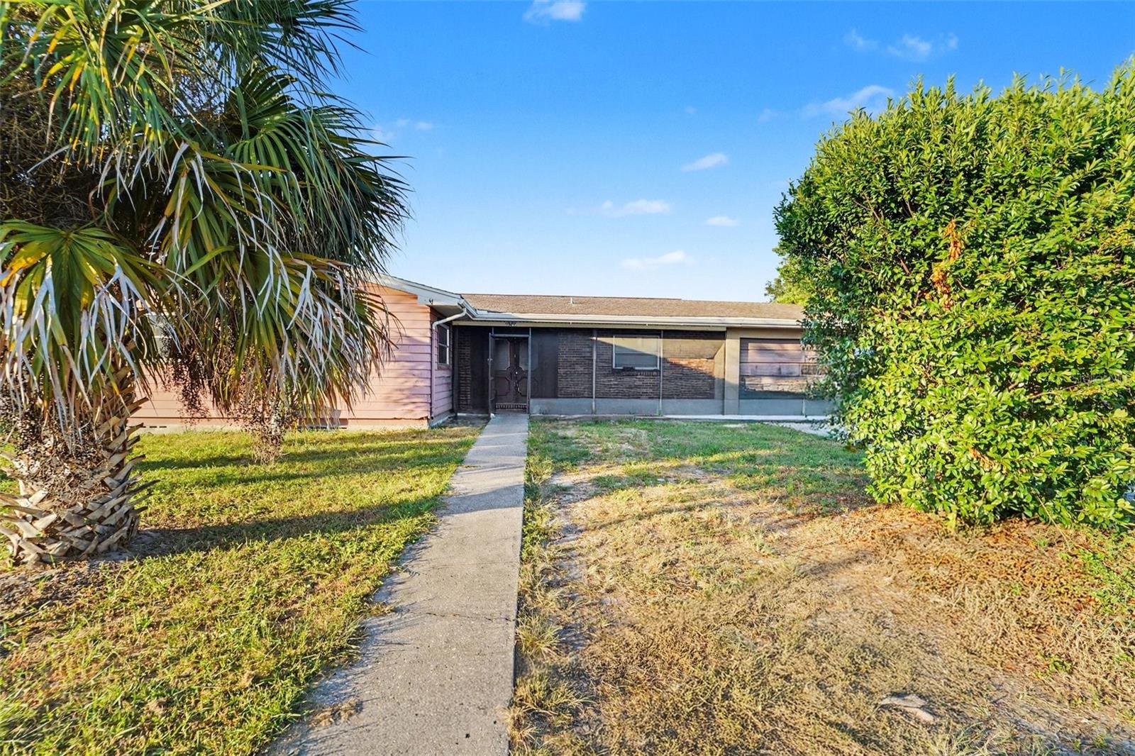 Welcome to this charming 1973 Spring Hill home offering 3 bedrooms, 2 bathrooms, and 1,248 square feet of comfortable living space. Featuring an 8-year-old roof and durable tile flooring throughout, this property provides a solid foundation for your personal touches and updates.Enjoy two screened porches perfect for relaxing or entertaining, along with a fenced yard ideal for pets, gardening, or outdoor activities. A 1-car garage adds convenience and storage options. With great bones and plenty of potential, this home is ready for its next chapter. AC 2026. Water heater 2025. Bathroom toilets replaced in 2024. Bathtub & plumbing in primary bathroom updated in 2024. Flood zone X. All information is believed to be accurate & should be verified by buyer. See Realtor remarks.