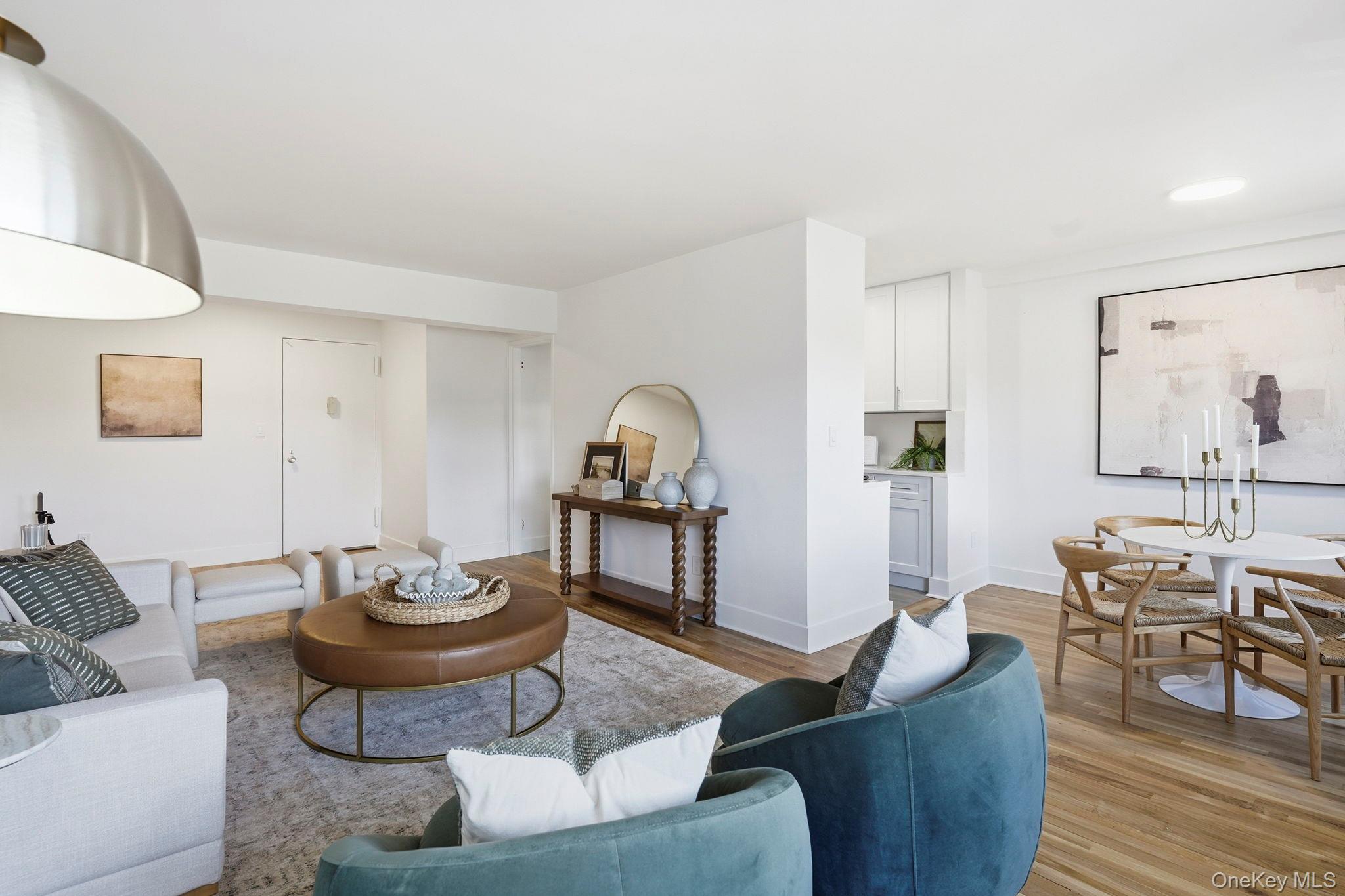 Welcome to 80 E Hartsdale—where comfort, convenience, and lifestyle come together. This beautifully renovated, sun-filled residence offers a seamless open layout with a spacious living and dining area, refinished hardwood floors, and sweeping golf course views from every window. The brand-new, thoughtfully designed kitchen features modern finishes tailored for today’s buyers, while the fully renovated bath adds a clean, elevated touch. Generously sized bedrooms are filled with natural light, creating a warm and inviting feel throughout. Situated in a well-maintained building with a welcoming lobby and manicured grounds, this home offers both tranquility and ease. Perfectly located in the heart of Hartsdale—just moments to the train, shops, dining, and everyday conveniences, plus a nearby Starbucks for your morning routine. A rare combination of peaceful views and prime location—this is one you don’t want to miss.