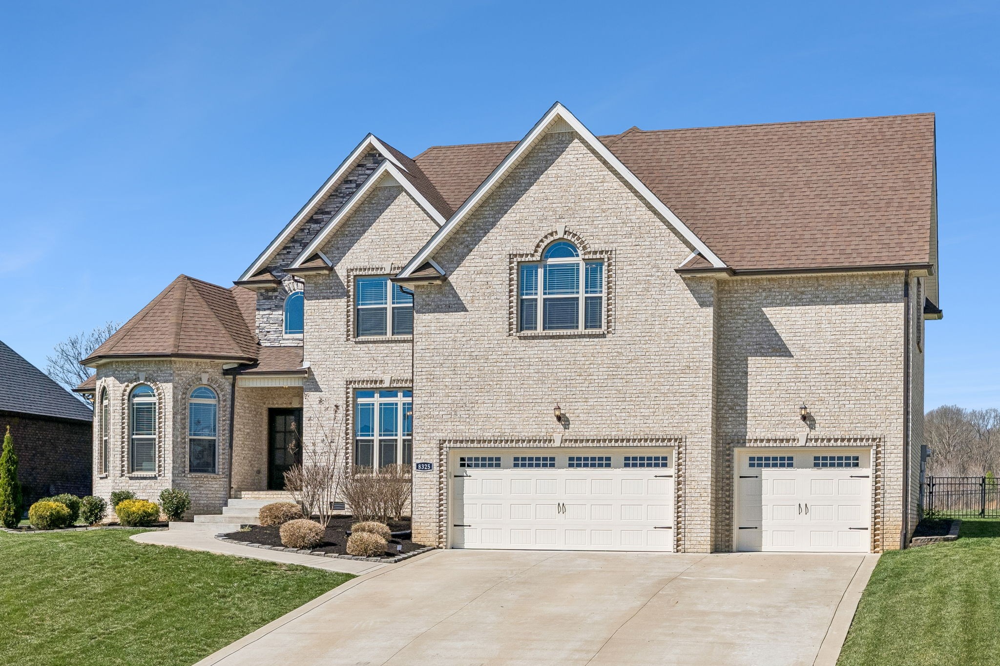 Stunning full brick home built in 2021 offering 3,174 square feet of beautifully designed living space! This spacious property features 4 bedrooms, 3.5 bathrooms, and a 3-car garage, providing plenty of room for comfortable living and entertaining.The thoughtfully designed floor plan includes a primary suite on the main level, offering privacy and convenience. The main living area features an open layout ideal for gatherings, while the kitchen provides ample counter space, cabinetry, and a great flow for everyday living.Upstairs, you'll find generously sized secondary bedrooms along with a massive bonus room over the garage, perfect for a media room, playroom, home gym, or additional living space.With its durable full brick exterior, modern construction, and spacious layout, this home offers both style and functionality. The 3-car garage provides abundant storage and parking space, making this property ideal for growing families or those who simply want extra room to spread out.