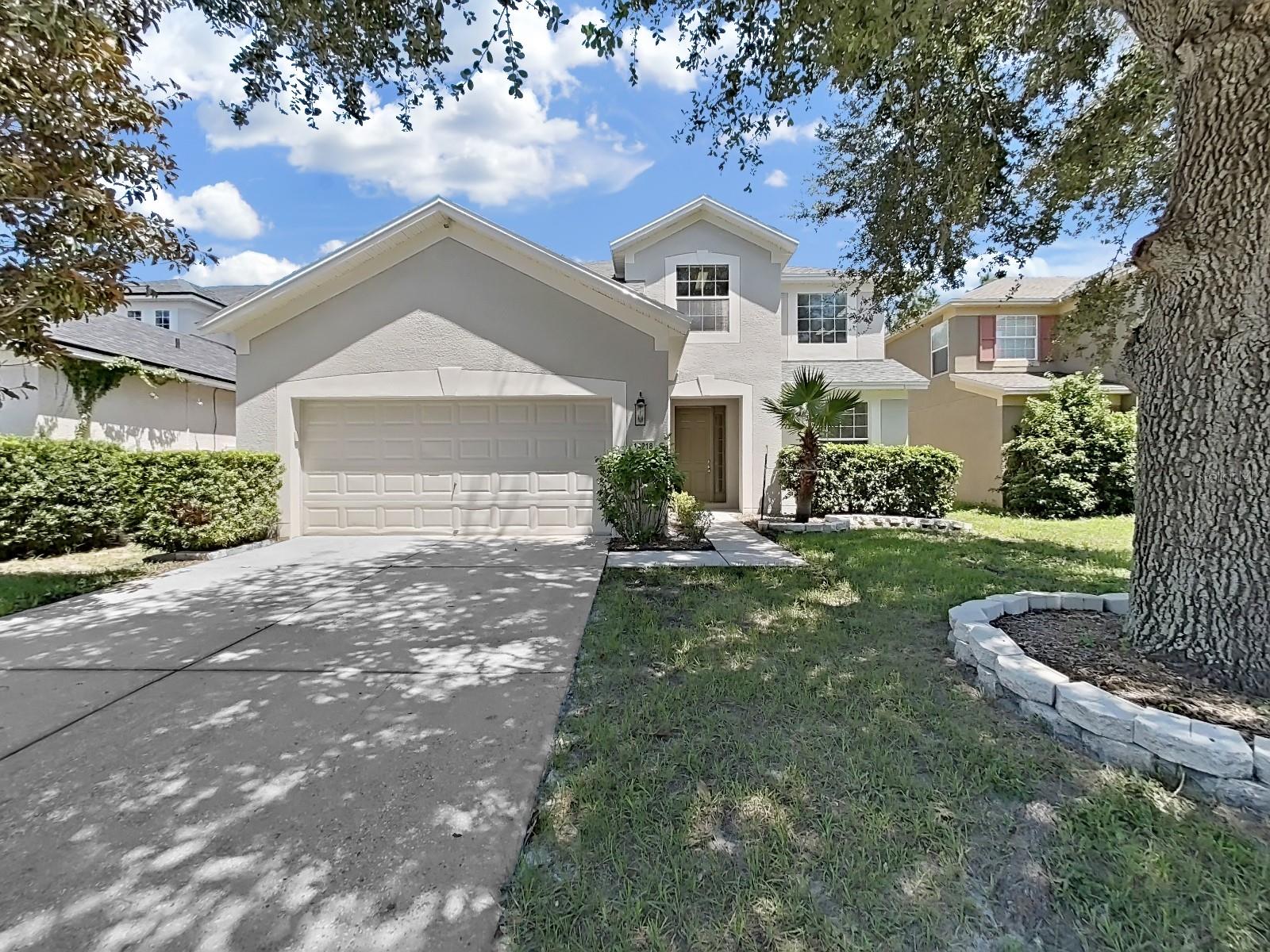 Welcome to a beautifully property in the highly desirable Trillium Community of Brooksville! This spacious 2-story, 4-bedroom, 3-bathroom, 2-car garage home offers a perfect blend of comfort, style, and convenience. With a brand new roof and exterior paint it's ready for you to move right in.

Step inside and you’ll immediately appreciate the bright, open floor plan with soaring ceilings and natural light filling every room. The kitchen is designed for both function and entertaining, featuring modern appliances, ample cabinet and counter space, and a breakfast bar that flows seamlessly into the living and dining areas. Whether hosting family gatherings or enjoying a quiet evening at home, this layout offers flexibility for any lifestyle.

The primary suite is your private retreat with a huge walk-in closet and en-suite bathroom complete with dual sinks, a soaking tub, and separate shower. The additional bedrooms are generously sized and perfect for family, guests, or a home office.

Step outside to your covered lanai and fully fenced backyard, ideal for relaxing, grilling, or enjoying Florida’s sunshine year-round.

Living in Trillium means enjoying resort-style amenities including a sparkling community pool, sidewalks, streetlights, and a playground—all with low HOA fees and no CDD. Plus, you’re just minutes from shopping, dining, schools, and easy access to the Suncoast Parkway for a quick commute to Tampa, the airport, or Florida’s Gulf Coast beaches. Don't miss your opportunity to to discover the best of Florida living!