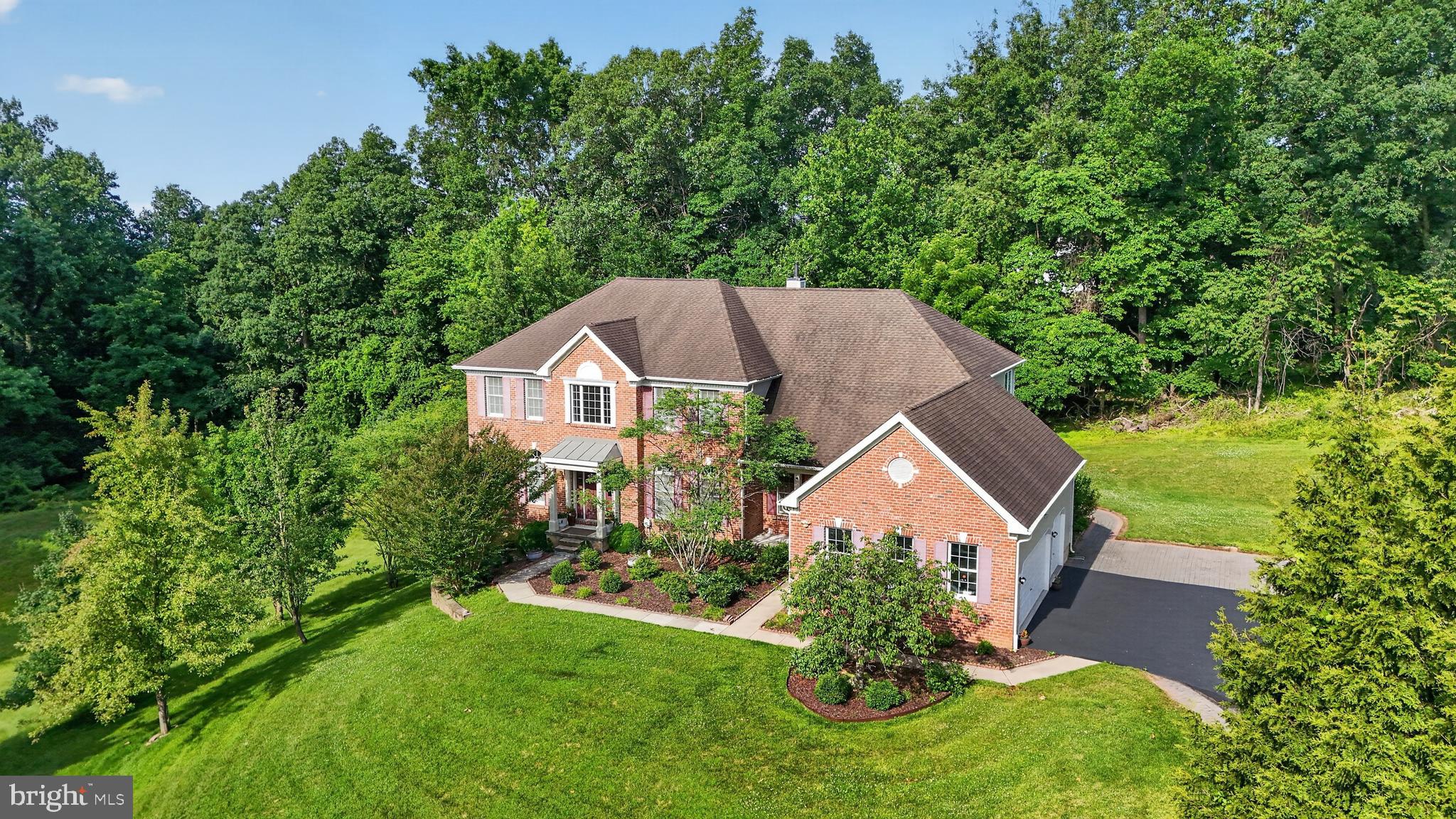1464 W Stonington Drive – Luxury Living in The Reserve at Chestnut RidgeNestled on a beautifully landscaped 0.73-acre homesite in the highly desirable Reserve at Chestnut Ridge community, this remarkable residence combines spacious design, modern updates, and exceptional comfort within the acclaimed Downingtown Area School District. Offering 4 bedrooms and 5.5 bathrooms, the home has been meticulously maintained and enhanced with numerous upgrades, including rich hardwood flooring, freshly updated interior finishes, a tankless water heater, Tesla charging station, gutter protection system, and a newly installed HVAC system (2026).A dramatic two-story entrance welcomes you into an inviting floor plan designed for both everyday living and elegant entertaining. The main level includes formal and casual gathering spaces, a dedicated home office, and a conveniently located powder room. The centerpiece of the home is the expansive gourmet kitchen, featuring recently upgraded stainless-steel appliances, gas cooking, abundant storage, and a spacious dining area. Large doors provide direct access to the outdoor living area, creating an effortless connection between indoor and outdoor spaces.The upper level offers a luxurious owner's retreat complete with a spacious sitting area, spa-inspired bathroom featuring dual vanities and a soaking tub, and generous closet space. Three additional bedrooms are thoughtfully designed, each with its own private full bathroom, ensuring comfort and privacy for family members and guests.The finished lower level expands the home's versatility with a full kitchen and full bathroom, making it well suited for multigenerational living, guest accommodations, a recreation area, or a private retreat.Outdoor living is equally impressive, highlighted by a large AZEK deck and patio areas overlooking the expansive backyard. The property's exterior showcases durable upgraded Hardie Plank siding along the sides and rear of the home, enhancing both appearance and long-term value.Ideally situated in West Bradford Township, residents enjoy a peaceful neighborhood setting with convenient access to major commuting routes, shopping destinations, restaurants, parks, and public transportation. This outstanding property presents a rare opportunity to own a sophisticated home in one of Chester County's most desirable communities. Schedule your private tour today and experience everything this exceptional residence has to offer.