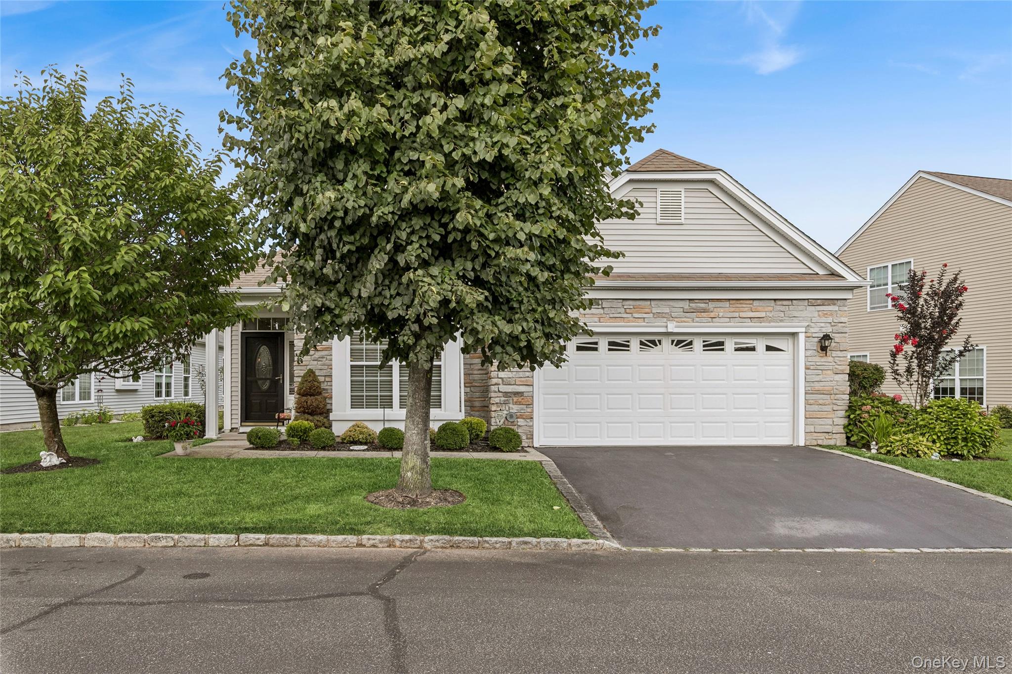 Welcome to easy living in this beautifully maintained, one floor ranch style detached home (Claremont model) in a sought after 55-and-older community. This inviting home features a bright spacious layout with a formal dining room, formal living room, den/great room and a well appointed eat-in kitchen featuring center island, granite and stainless appliances. The primary suite includes a private bath with two separate vanities, shower, soaker tub and water closet for the toilet. Also included is a large walk-in closet for all your personal belongings. A second bedroom and full bathroom are perfect for guests or office. Enjoy the convenience and security of a two-car garage and the peace of mind of low maintenance living in a double gated community. Your amenities include both indoor and outdoor pool, indoor hot tub, club house, tennis courts, bocce courts, putting green and more.