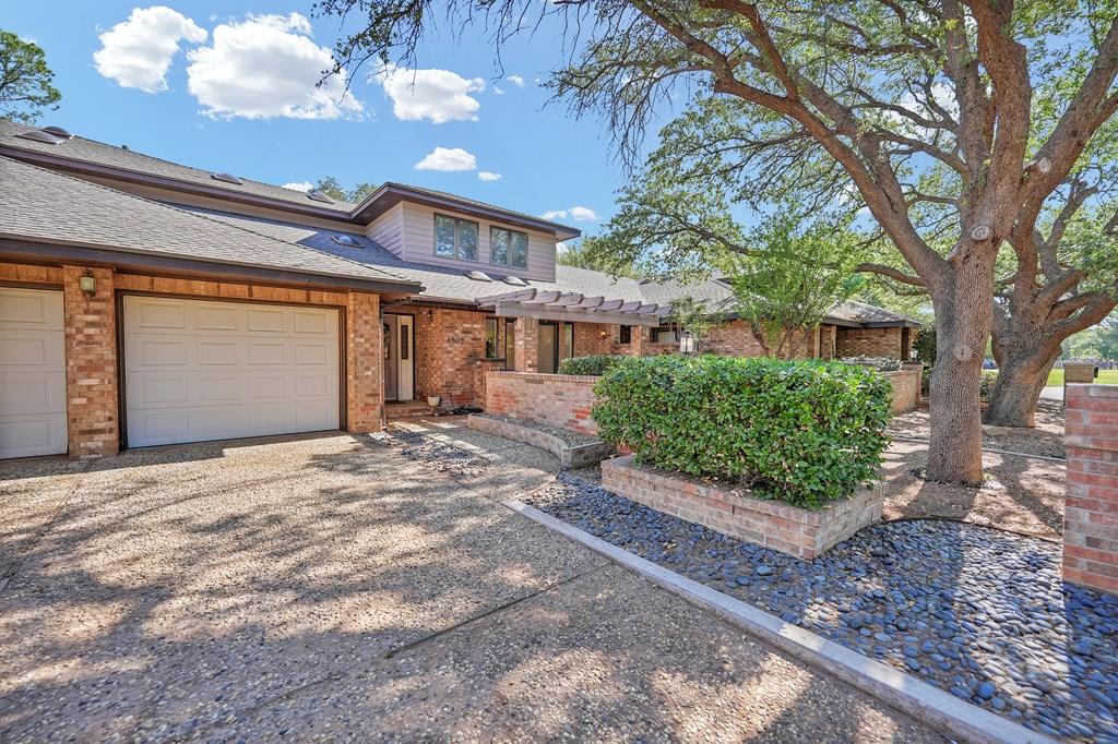 STUNNING 2-STORY TOWNHOME IN GREEN TREE OFFERING 2,848 SQ FT OF STYLE AND CHARACTER WITH SOARING WOOD BEAM CEILINGS, FLOOR-TO-CEILING WINDOWS, AND MULTIPLE FIREPLACES. THE REMODELED KITCHEN FEATURES QUARTZ COUNTERS, STAINLESS APPLIANCES, LARGE ISLAND, AND ABUNDANT STORAGE. SPACIOUS PRIMARY SUITE WITH SPA-LIKE BATH, WALK-IN CLOSETS, AND PRIVATE RETREAT FEEL. ENJOY LOW-MAINTENANCE BACKYARD EXCLUSIVE TO THIS UNIT - NOT A SHARED SPACE, WITH COURTYARD FEEL, MATURE TREES, AND GOLF COURSE SURROUNDINGS.