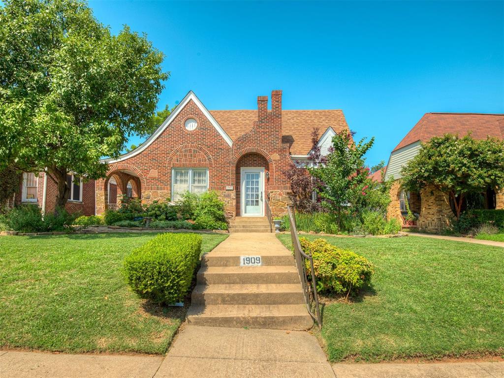 Timeless Tudor in the Heart of OKC – Steps from the Plaza District!

This stunning 1920s Tudor blends historic charm with modern comfort in one of Oklahoma City’s most sought-after neighborhoods. Just a short stroll from the Plaza District’s vibrant local shops, restaurants, and art scene, this home boasts incredible curb appeal with lush landscaping, a stone walkway, and a peaceful, tree-lined setting.

Inside, you’ll find original hardwood floors, custom wood window shades, and large windows that flood the space with natural light. The flexible layout includes two spacious living areas, a formal dining room, and French patio doors that open to a large flagstone patio—ideal for entertaining or relaxing outdoors. The kitchen is beautifully updated with granite countertops, a mix of gas and electric stove, cherry wood cabinetry, updated backsplash, and a wet bar with direct access to the backyard through double doors.

Upstairs, a private retreat awaits with a large bedroom, a bonus area, and its own bathroom—perfect for guests or a secluded primary suite. Downstairs includes a basement with laundry hookups and a new hot water tank.

This home also features a 5-ton HVAC system with heat pump, a Class 4 impact-resistant roof, a peaceful and oversized backyard with mature landscaping, and two storage sheds for added convenience. The side porch with swing adds charm, while four separate exterior exits provide easy access to the backyard and side areas. A private drive with backyard gate access to the carport ensures secure and flexible parking options.

All of this in a lovingly maintained historic home just minutes from Midtown, Uptown, and everything that makes OKC an incredible place to live. Welcome Home!