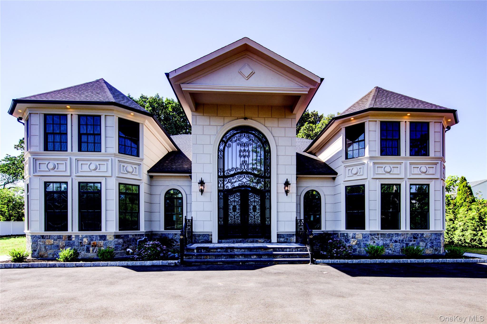 Welcome to this stunning 6,000 sqft luxury home that effortlessly combines space, comfort, and modern elegance. Designed with meticulous attention to detail, this grand residence offers 7 spacious bedrooms, including 3 exquisite suites, each providing ultimate privacy and luxury. With a total of 5 and a half baths, every corner of this home is designed for convenience and relaxation.The main level flows seamlessly between the large living areas, which are perfect for both intimate gatherings and entertaining on a grand scale. The open-concept layout showcases rich, high-end finishes, from gleaming hardwood floors to custom cabinetry.For added comfort, this home features radiant heating, ensuring warmth throughout the colder months and creating an inviting atmosphere year-round.The home is also prepped for an elevator option, providing effortless access to all levels, adding an extra layer of convenience and accessibility.This exceptional property is a true masterpiece—whether you’re hosting  friends, or simply seeking a retreat to unwind, it offers everything you need and more. HOUSE IS UNDER CONSTRUCTION. 90% COMPLETE. DO NOT STEP ON PROPERTY WITHOUT LISTING AGENTS. ADT ALARM & 24/7 CAMERA RECORDING.