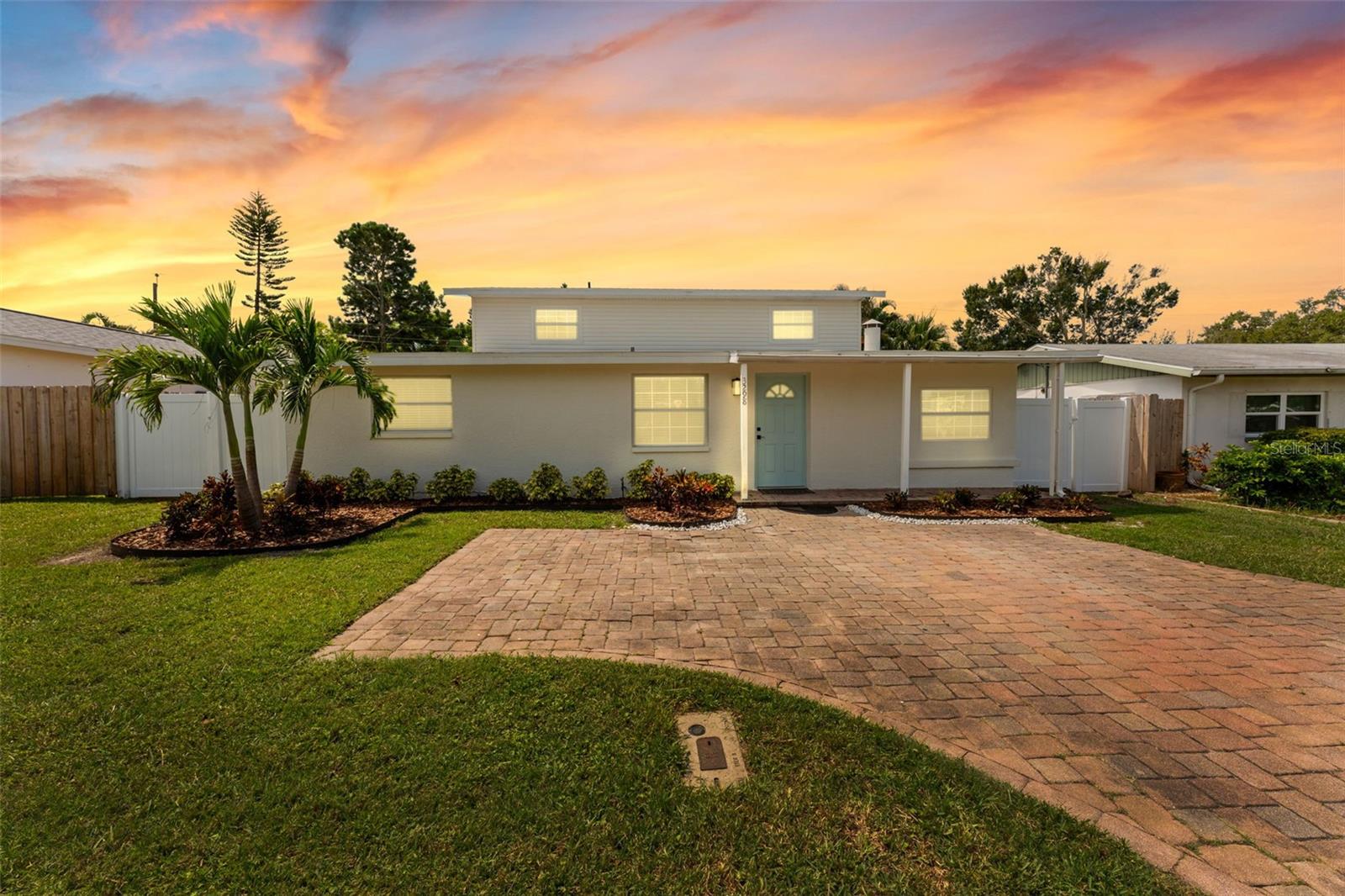 Five bedrooms and a split floorplan give everyone room to breathe, and the multiple living spaces are yours to make your own whether that's a home office, playroom, or something else entirely. The kitchen was fully redone with stainless steel appliances, green cabinetry, and a fresh backsplash. All three bathrooms have been updated, the primary suite has a large walk-in closet, and the roof was replaced in 2021. For the size and the updates, this is the best bang for your buck on the market right now. Situated in Largo, you're five minutes from a Pinellas Trail access point for biking or walking, ten minutes from the Gulf, and close to Largo Central Park, which has a dog park, nature center, sports fields, and walking paths. Everyday shopping, dining, and services on Indian Rocks Road and Ulmerton are just minutes away, and the Clearwater corridor is a short drive north.