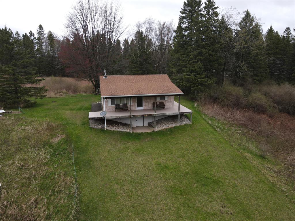 Welcome to Long Shaft Lodge, located just 5 miles from Rose City in Ogemaw County! This diverse 81.5 ac +/- has been meticulously maintained for the past 35 years. The home features 2 bedrooms and 1 bath, vaulted ceiling in the kitchen/ living room, large deck and full walk out basement. Out front is a 30'x30GÇ¦ steel framed barn with power & newer concrete for toy and equipment storage. A well-groomed trail system gives excellent access to the multiple box blinds and established food plots. If you like fishing, the Prior Creek flows through the southern part of the property and has provided some great trout fishing over the years. Although close to town this property is very secluded and accessed through a gated easement that brings you to the gate at the property which then has a 1/4 long driveway to get to the main part of the property. This property is turn key with deer blinds, home furnishings and some equipment included. Call the listing agent directly for more information on this fantastic Michigan Whitetail Property!
***Maps contained on our sites are there to simply depict the over all layout or shape of a given property and show what it looks like from an aerial view. These maps are neither a legally recorded map, or any type of a legal survey and should never be used as such. Also "Acreage" amounts are displayed as according to the information we have obtained through local government and are in no way guaranteed or warranted to be exact**
