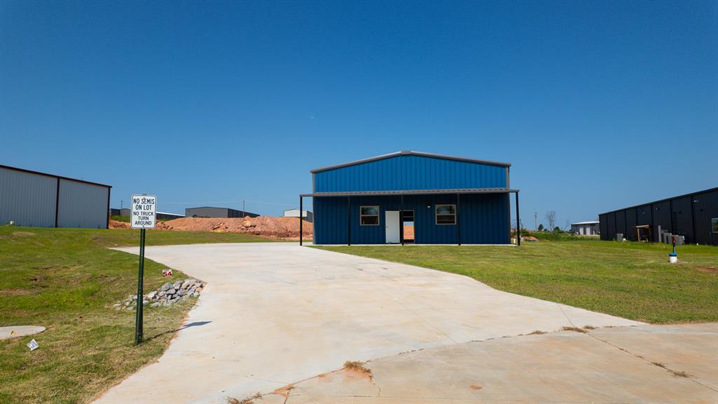 Welcome to Koloa Industrial Building #54, an excellent choice for your business needs! This 4,000 SqFt building for sale in Edmond, OK is located in the newly-built Koloa Industrial park. Conveniently situated off Sooner Road & Charter Oak Road just west of I-35, this building is equipped with a well & septic system, 3-phase 400 amp electrical, and two large garage doors so you can easily access and transport equipment or goods for storage or export. This building also features 16' tall ceilings and spray foam insulation, ensuring comfortable and energy-efficient use.

We are offering Owner Financing on this property for only a 10% downpayment. If you decide to finance with us there are NO credit checks, early payoff penalties, or hidden fees! We also welcome third-party financing and cash offers.

-1.00 Acre Lot
-4,000 SF building
-16' Ceilings
-3-Phase 400 Amp Electric to Building
-2 Overhead Garage Doors 1 side and 1 back
-Closed Cell Spray Foam Insulation
-Well & Pressure Tank
-Septic
-Natural Gas at the property
-Fiber at property