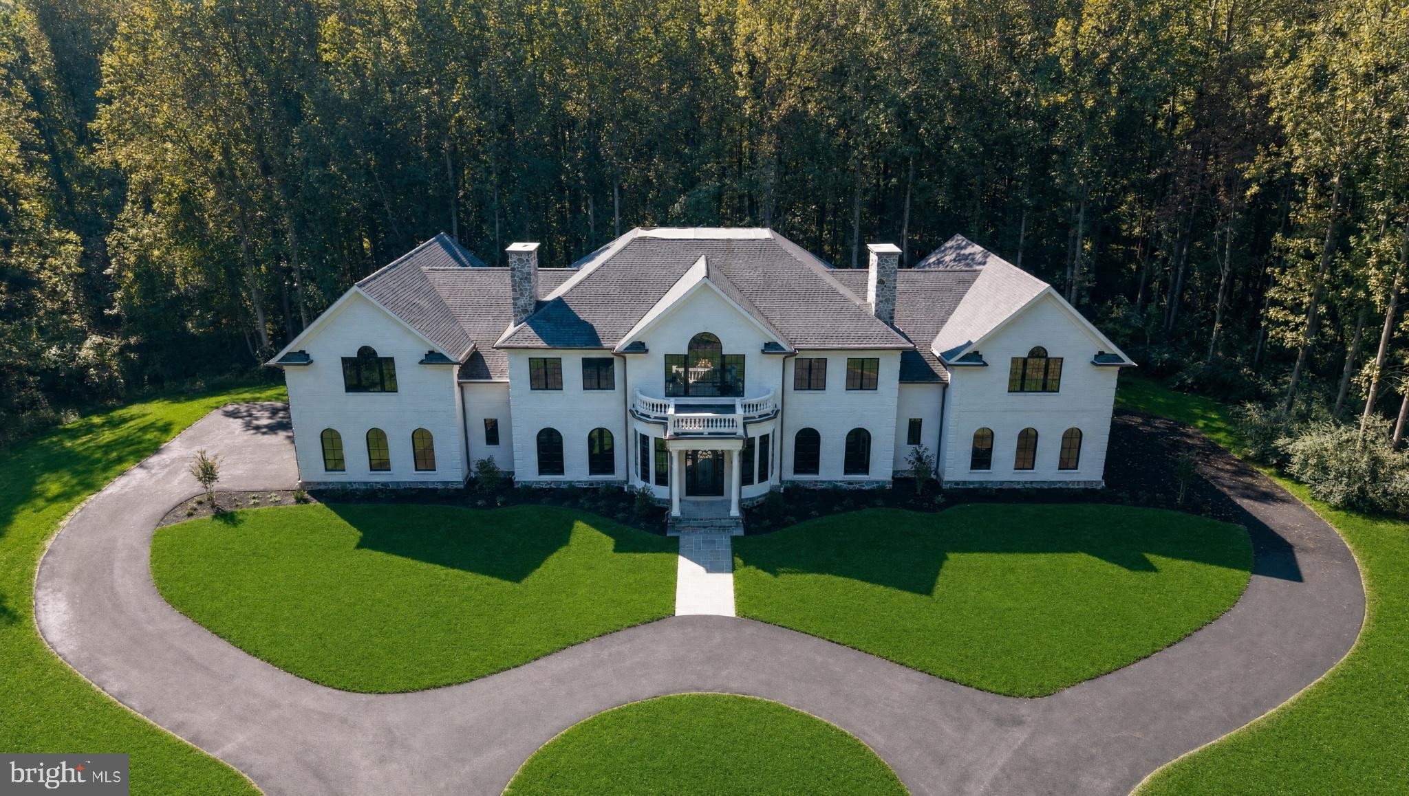 **Now Offered at $4,850,000.** A rare opportunity to own one of the Mid-Atlantic's most private luxury estates. Tucked away on 65 breathtaking acres, 928 Fenario Circle offers complete seclusion without sacrificing accessibility. From the moment you enter the winding private drive, the outside world disappears—yet you're just minutes from I-95, approximately 15 minutes to the nearest Amtrak/MARC station, 40 minutes to Baltimore, and within easy reach of Washington, D.C. and Philadelphia. Thoughtfully designed across more than 10,000 square feet, this newly constructed estate blends timeless architecture with refined modern design, creating exceptional spaces for entertaining, everyday living, and multi-generational enjoyment. Expansive interiors, seamless indoor-outdoor living, and extraordinary privacy combine to create an estate experience rarely found in such a convenient location. Recently repositioned to $4,850,000, this is an exceptional opportunity to acquire one of the region's premier private estates. Private showings by appointment only.