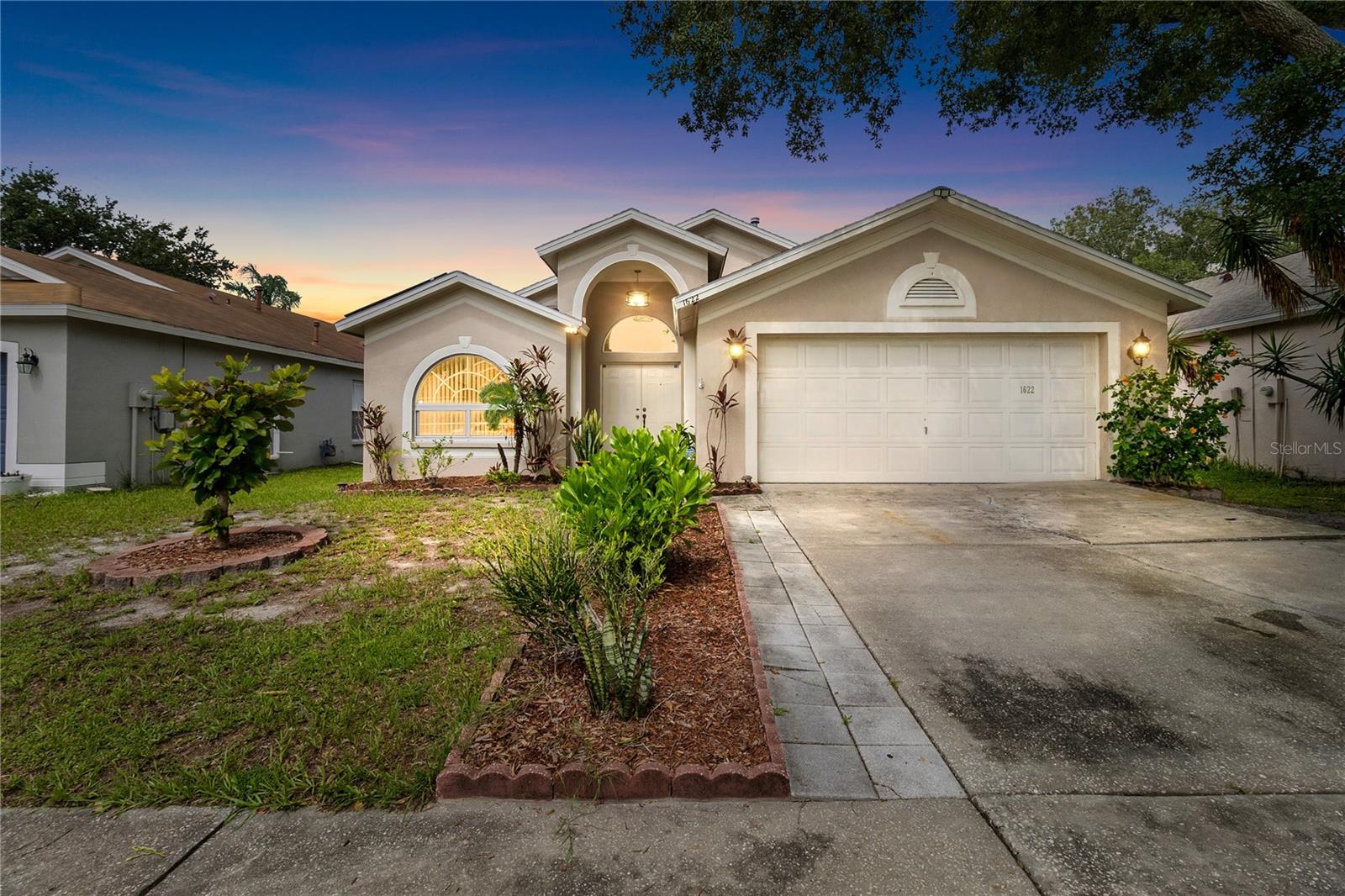 Tired of rising electric bills? Welcome home to this beautifully renovated Suarez-built home featuring fully paid-off solar panels, helping you enjoy energy efficiency and long-term savings.Located in the highly desirable Sterling Ranch community, this meticulously maintained residence offers 3 bedrooms, 2 full bathrooms, and a dedicated office/den that can easily serve as a fourth bedroom. The thoughtfully designed open-concept floor plan is filled with natural light and is perfect for both everyday living and entertaining.At the heart of the home is a stunning, fully updated kitchen featuring 42-inch cabinetry, quartz countertops, a breakfast bar, pantry, and stainless steel appliances, including a gas range for the home chef. The spacious living and dining areas flow effortlessly together, creating a warm and inviting atmosphere.The private primary suite offers a relaxing retreat with a spa-like ensuite bathroom complete with dual vanities, a garden tub, a large walk-in shower, and an oversized walk-in closet.Step through the sliding glass doors into the expansive Florida room, where you can relax while overlooking the peaceful backyard dotted with mature fruit trees. Whether you're enjoying your morning coffee or unwinding with a glass of wine at sunset, this versatile space is sure to become a favorite.Residents of Sterling Ranch enjoy outstanding community amenities, including a resort-style pool, clubhouse, playground, and park, all with NO CDD fees. Conveniently located just minutes from Brandon Mall, shopping, dining, entertainment, A-rated schools, I-75, US 301, and the Selmon Expressway, this home offers the perfect combination of comfort, convenience, and lifestyle.Don't miss your opportunity to own this move-in-ready, energy-efficient home in one of the area's most sought-after communities. Schedule your private showing today!