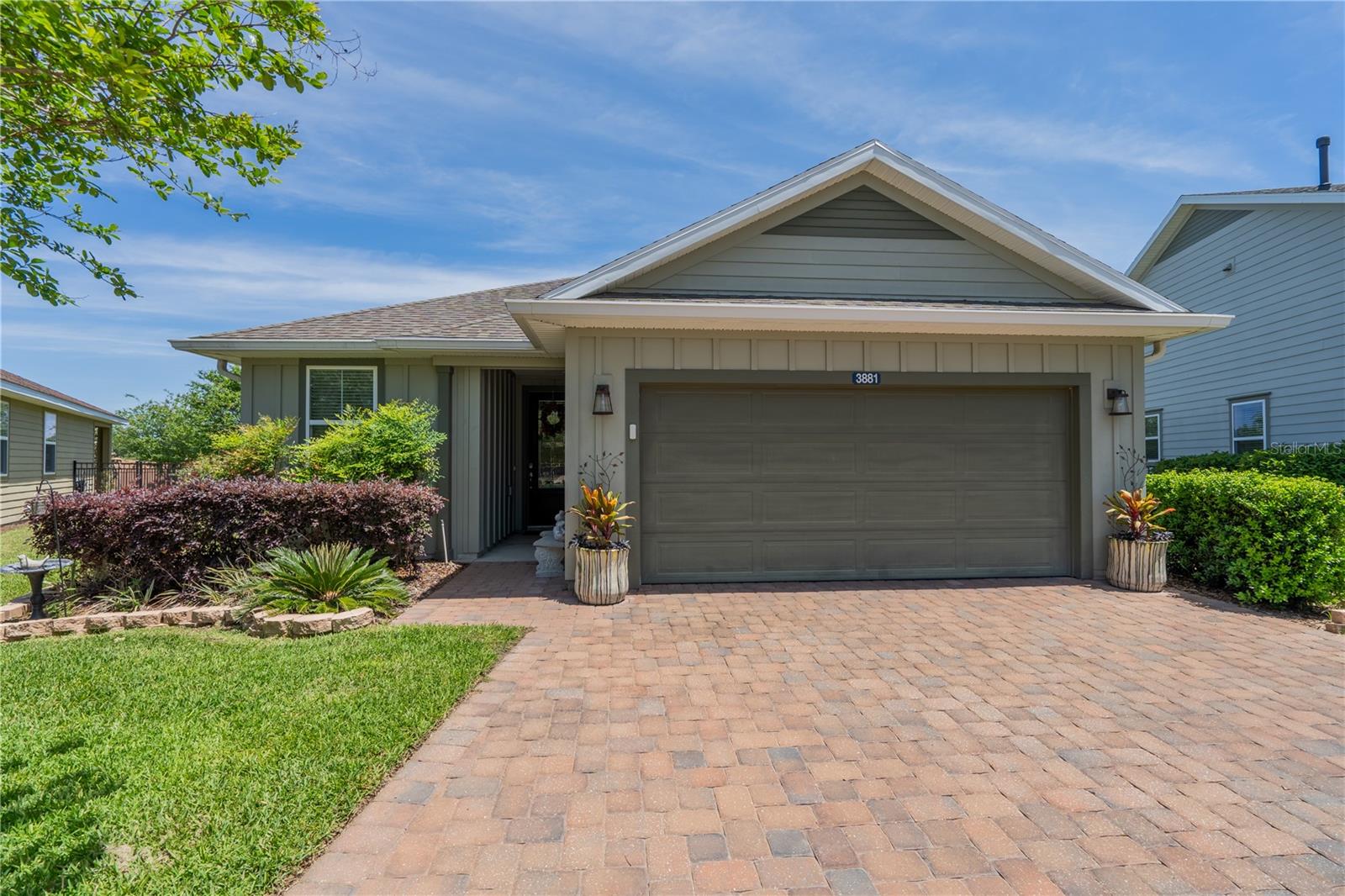 Tucked at the end of  quiet cul-de-sac in one of Ocala's most sought-after communities, this beautifully designed Rome model, built by Shea Homes, offers over 1,450 square feet of thoughtfully designed living space and a resort lifestyle to match.From the moment you step through the glass-insert front door, the craftsmanship is evident. Wood-look ceramic tile flows throughout the entire home, complemented by crown molding, volume ceilings, plantation shutters, and window blinds throughout. The open great room is ideal for entertaining, anchored by a chef's kitchen featuring solid cabinetry, granite countertops, stainless steel appliances, A lovely farmhouse sink, double oven, and gas cooking. The custom center island, finished with a striking live edge wood top which doubles your storage while serving as the design centerpiece of the home. Every appliance and major system is less than 8 years old, a true peace of mind from day one.The primary suite is a true retreat, complete with a spa-inspired ensuite featuring a seamless glass walk-in shower, dual granite vanities, a private water closet, walk-in closet, and additional linen storage. Guests will feel equally at home in the generous guest bedroom, served by a well-appointed bath with granite countertop and shower/tub combo. A dedicated office with a door offers flexible use as a third bedroom.Step outside to your screened lanai and take in peaceful pond views with no rear neighbors. The fully fenced backyard offers privacy and security, with a natural gas hookup ready for your grill and water access on the lanai for your plants. The oversized two-car garage and whole-home water softener round out a property that has truly been thought through.And then there's the community. Ocala Preserve is in a class of its own with a guarded, gated entrance into this neighborhood built around an 18-hole championship golf course and anchored by a full-service clubhouse and restaurant. Resort-style pools, a state-of-the-art fitness center, spa, tennis, pickleball, bocce ball, rock climbing, a dog park, and miles of bike and walking trails mean there's always something to do. Member-led clubs and activities make it easy to build a life here, not just a home.Best of all, the HOA includes basic cable, internet, lawn maintenance, and access to community pools and recreational facilities, so you can spend less time managing and more time living.This one won't last. Call David today for your private tour