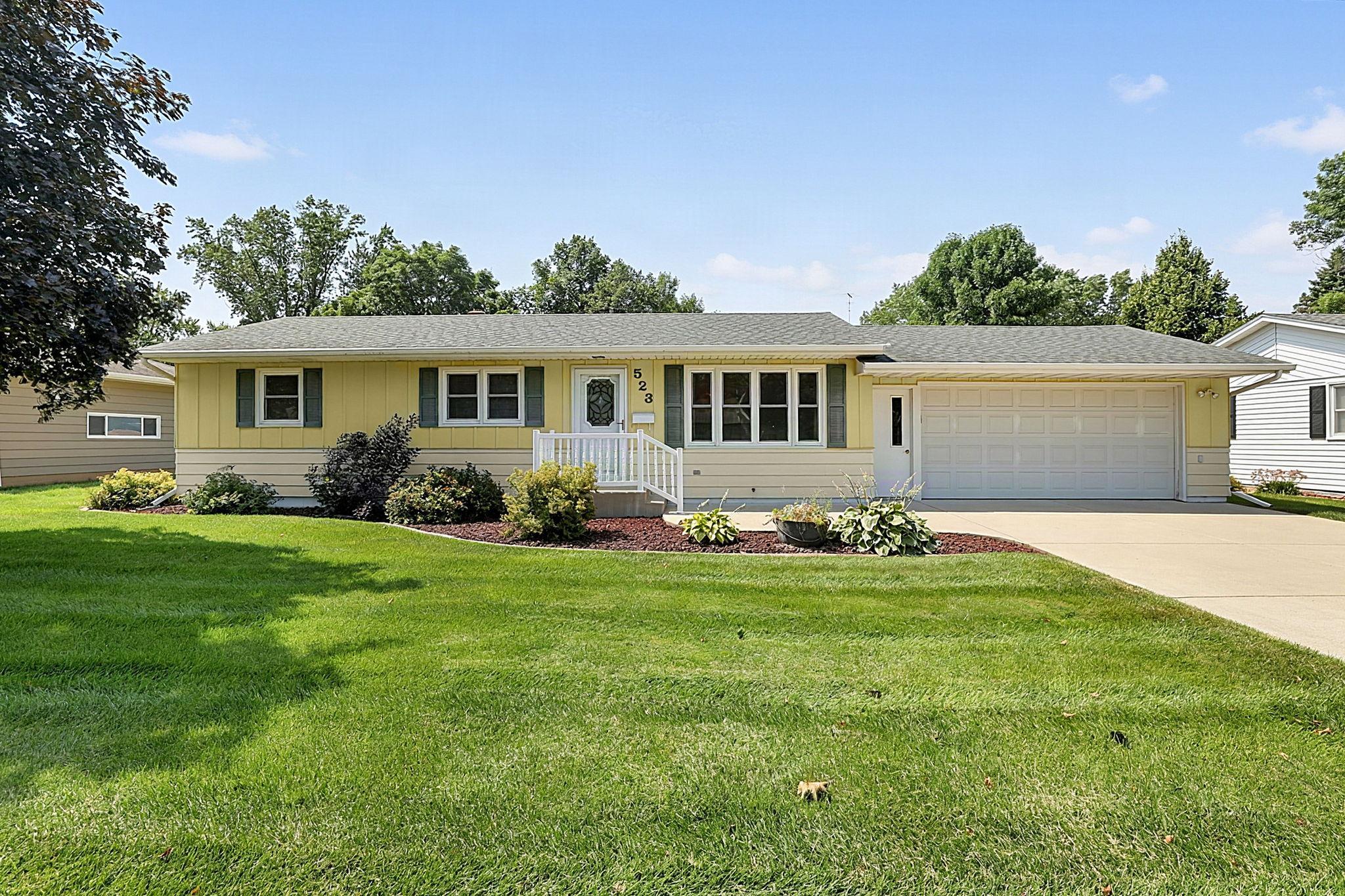 Beautifully maintained and move-in ready one-story home with 3 bedrooms on the main level and plenty of flexible living space!  The spacious great room addition is filled with natural light and features a cozy fireplace, creating a wonderful space to relax and entertain.  The great room also offers convenient access to the patio and laundry area.  The lower level provides even more living space with a versatile bonus room that could easily convert into a 4th bedroom - complete with egress window and closet.  Nicely landscaped yard features an inground sprinkler system, concrete driveway and patio. A sandpoint well for watering saves on water expenses.